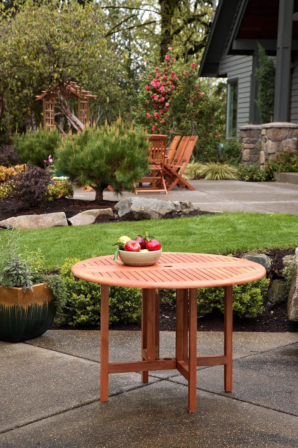 outdoor dining table with fire pit in the middle on Amazon Com Arboria 880 3285 7 Round Patio Table 42 Inch Diameter Drop Leaf With Outdoor Seating Space For 4 Garden Outdoor