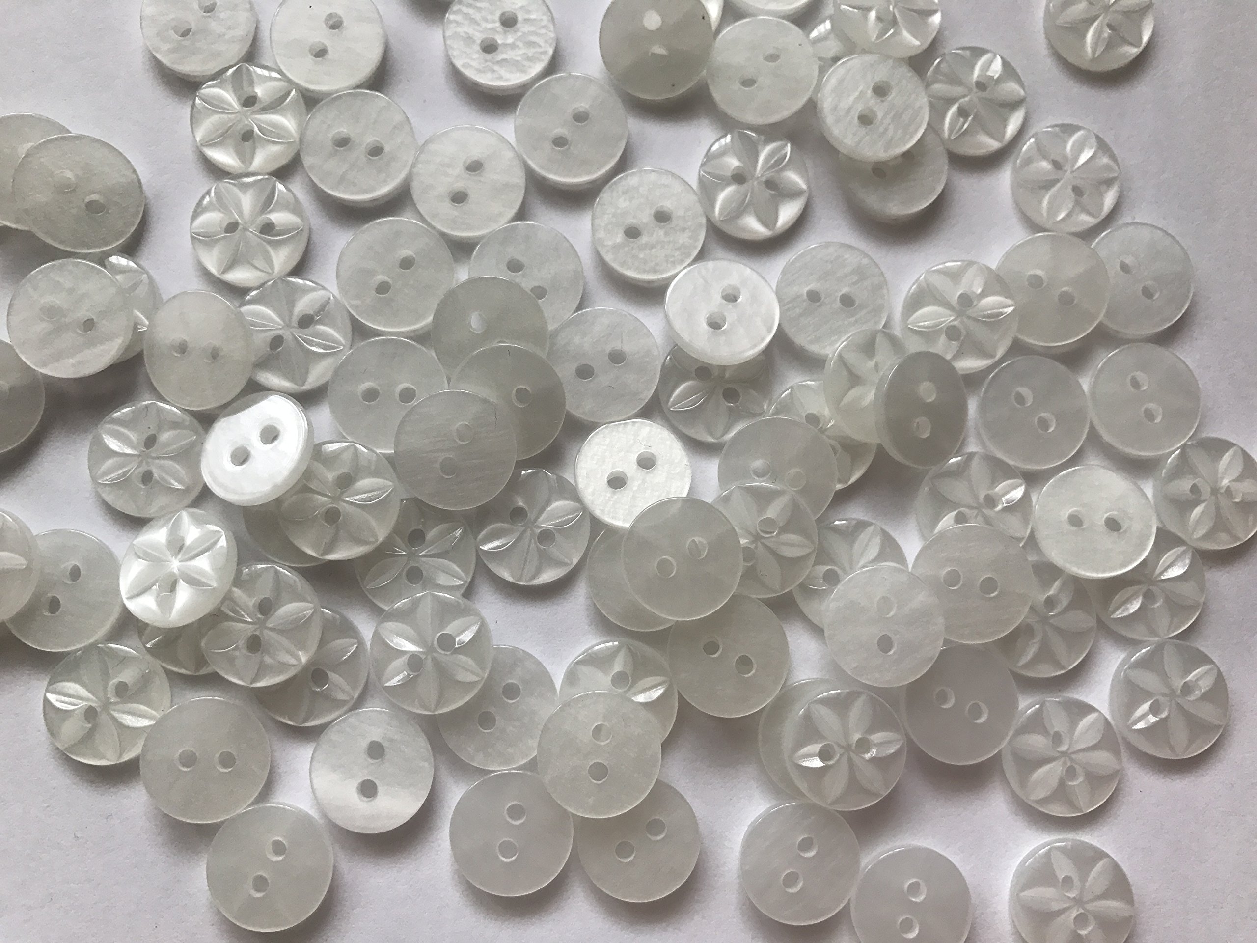 14mm Plastic Round Baby Star Buttons White - Pack of 100 Buttons by Minerva Crafts