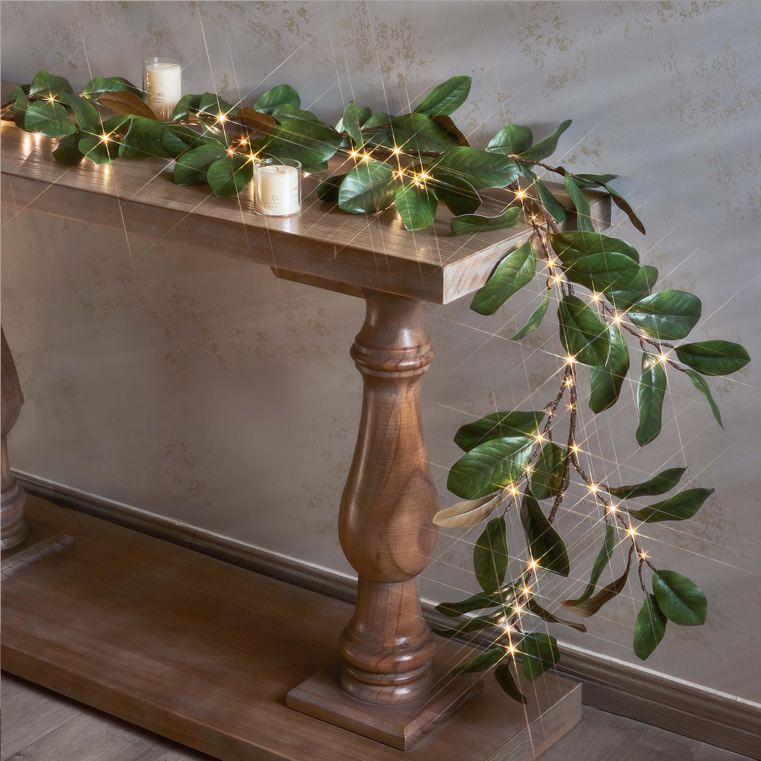 Photo 1 of Hairui Lighted Magnolia Garland Timer 6FT 80 LED Fairy Lights Battery Operated or USB Plug in, Artificial Greenery Vine with Lights for Spring Christmas Holiday Fireplace Decor