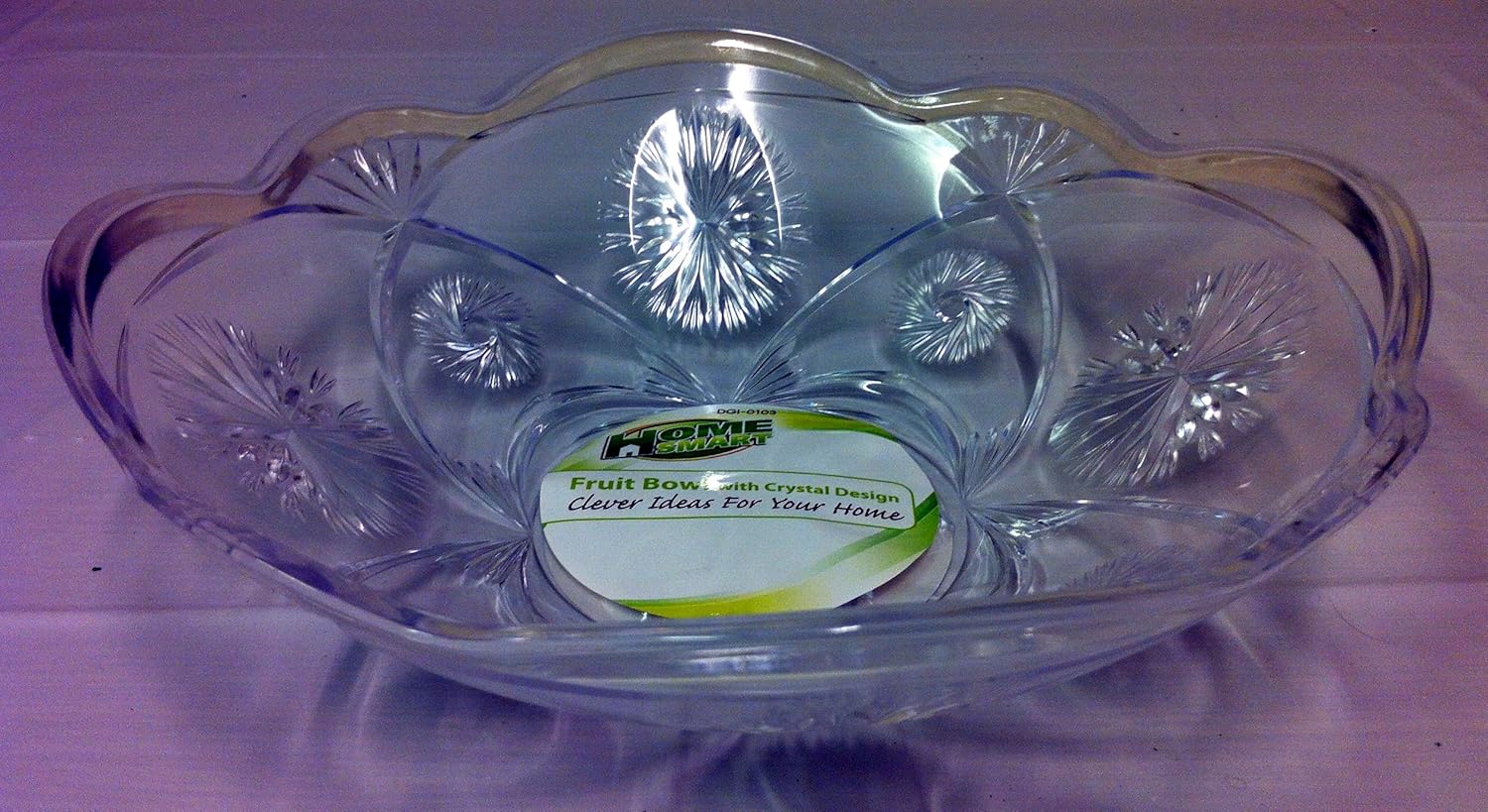 PLASTIC FRUIT BOWL. GENTLE SLOPE. CUT SWIRL EFFECT. CLEAR. GLASS