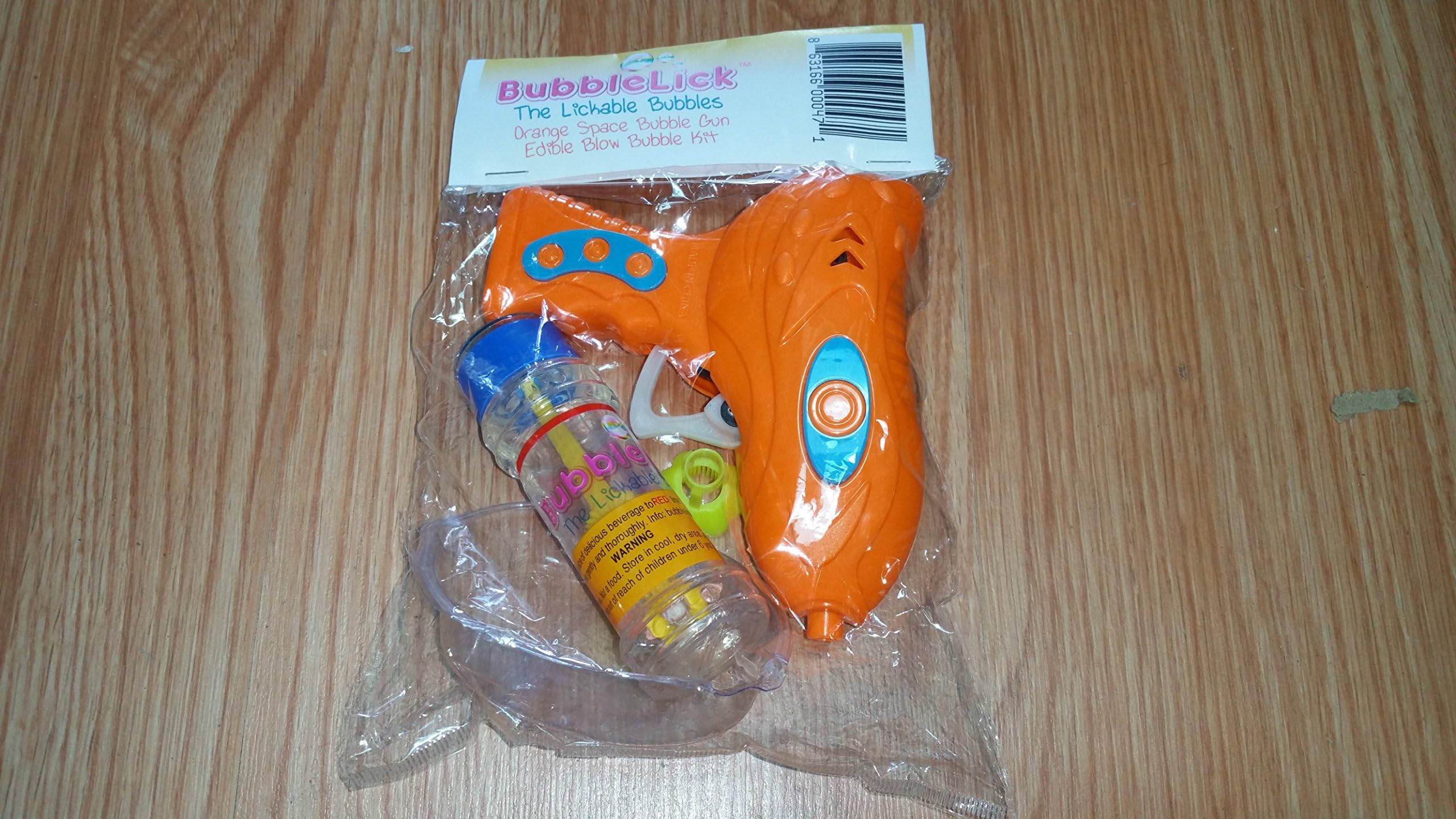 Bubblelick Tranovation Orange Space Bubble Gun Safe Edible Blow Bubble Kit