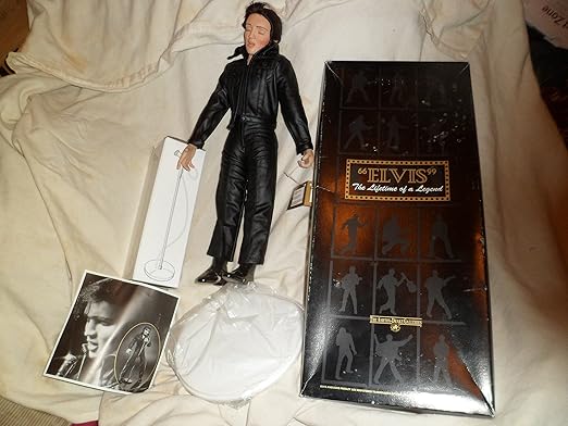 elvis porcelain doll