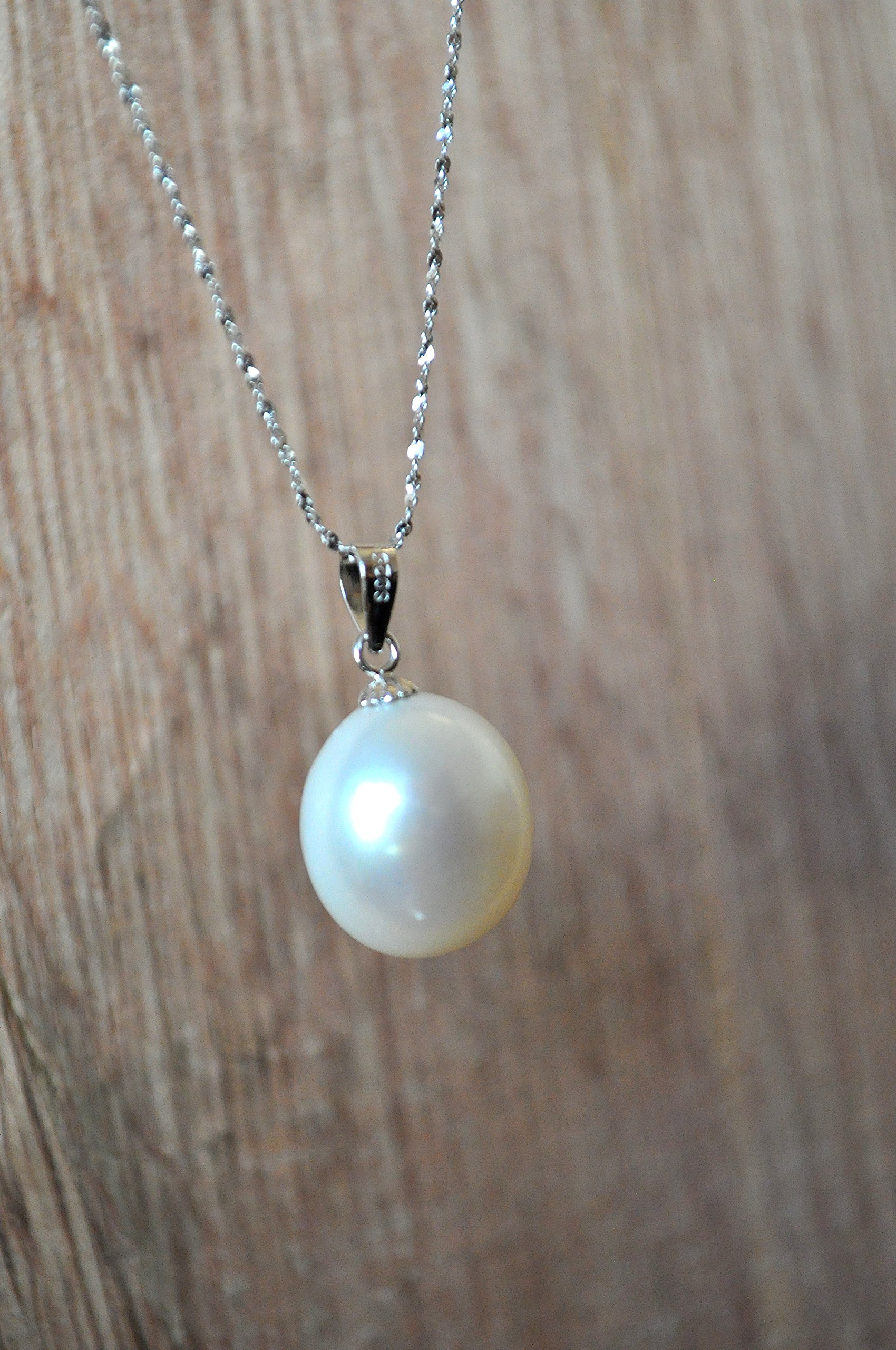 Sterling Silver Necklace with 17x15mm Fresh Water Pearl Pendant in 18" Length.