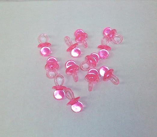pink plastic pacifiers for baby shower
