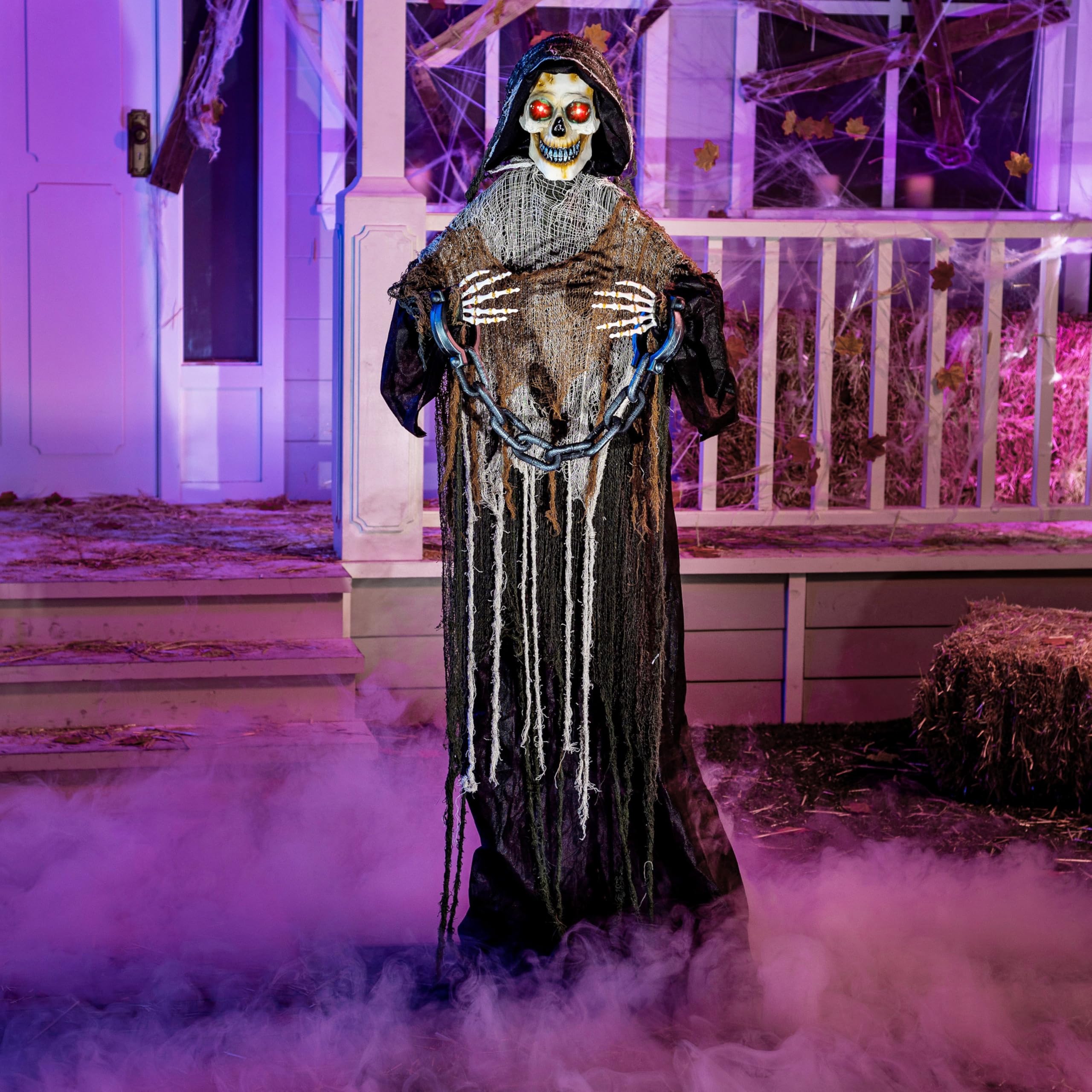 Photo 1 of JOYIN 67" Halloween Decorations Outdoor Life Size Animatronics Grim Reaper with Chain, Sound-Actived Party Decor with Creepy Sound, Scary Haunted House Props for Garden Yard Lawn