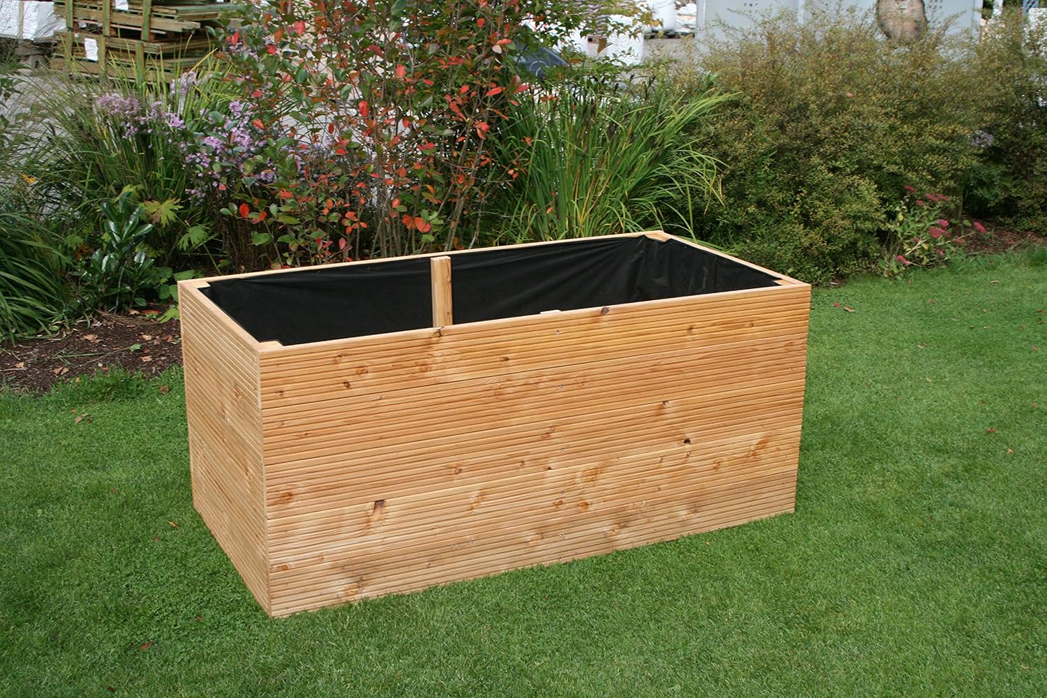 planteadas cama hecha de madera de hierbas maceta alerce flores ...