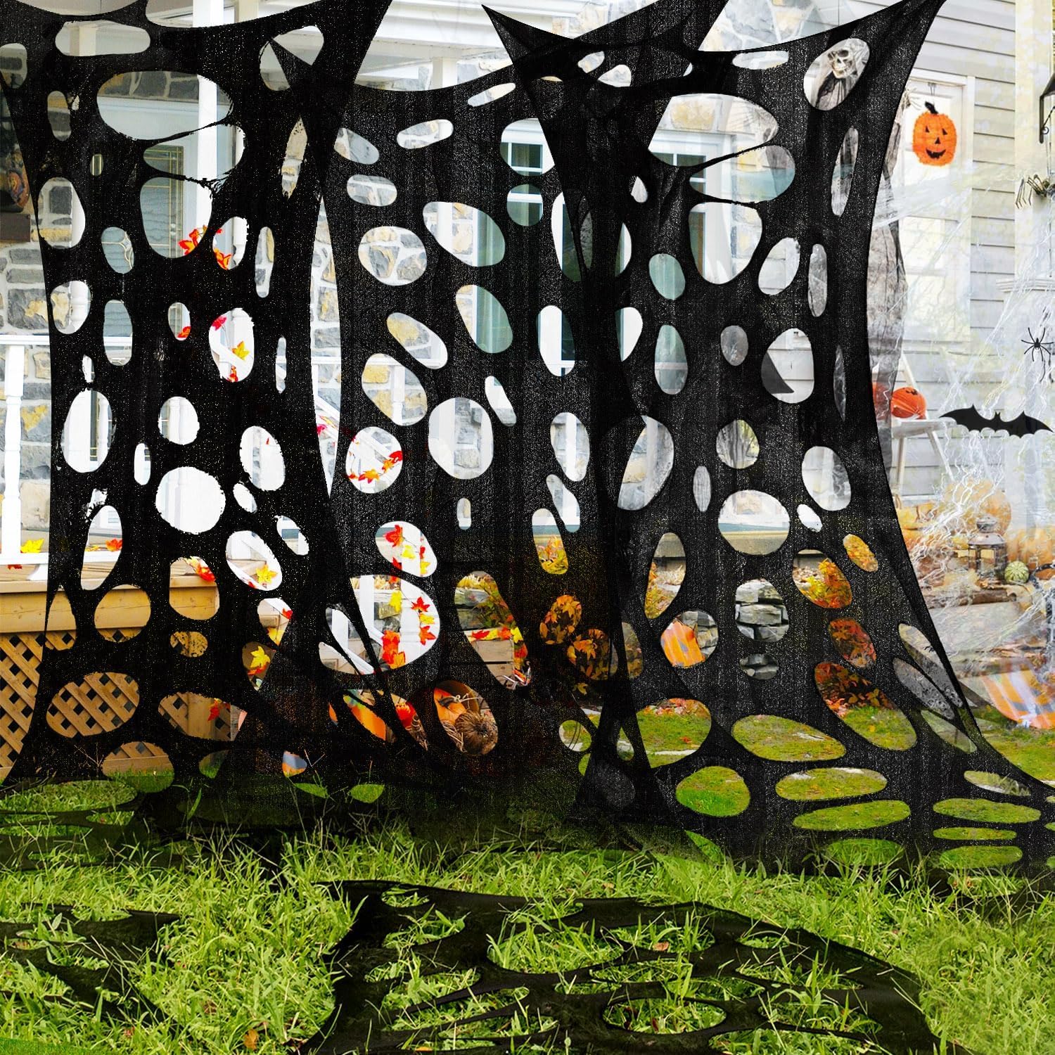 Photo 1 of 1000 Sqft ?After Streched with Holes?Uncut Black Giant Spider Web Halloween Decorations Outdoor with 10 Ground Nails Creepy Stretchy Beef Cloth Netting DIY Flexible Elastic for Yard Party Decor