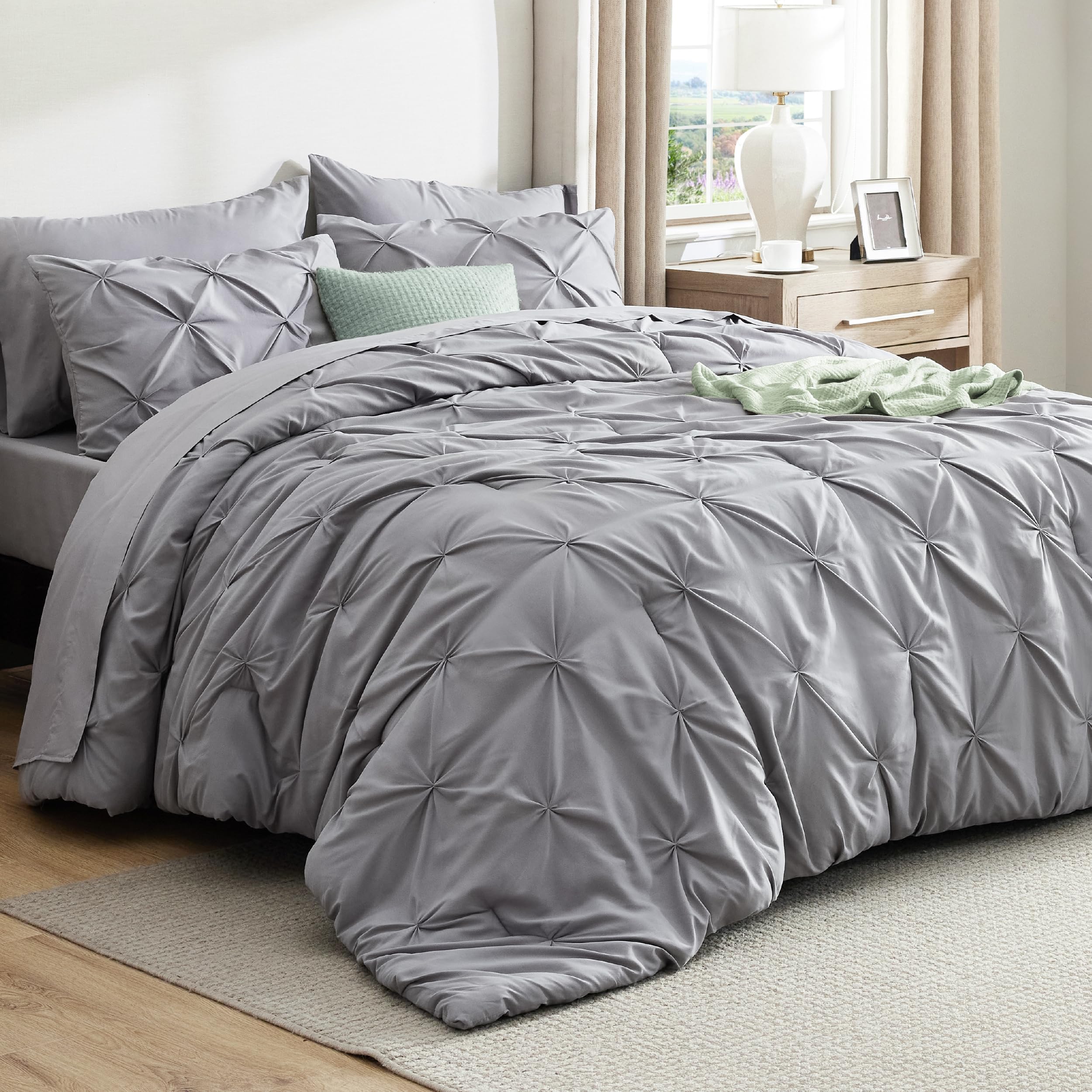 Photo 1 of Bedsure Oversized King Comforter Set Grey - Bed in a Bag Bedding Set 7 Pieces, GentleSoft™ Pintuck Bed Set Gift for Family, Pinch Pleat Grey Comforter with Sheets, Pillowcases & Shams