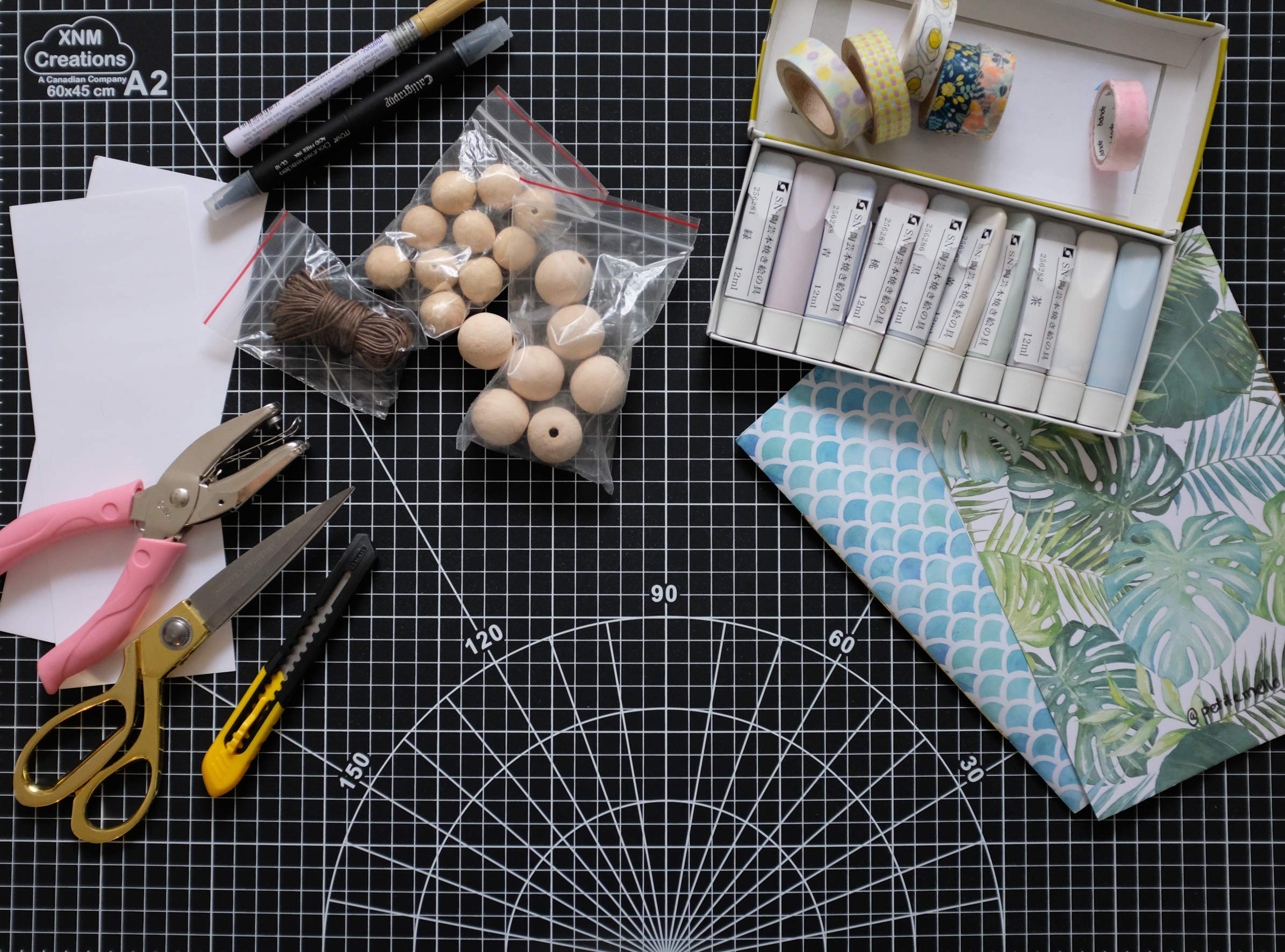 XNM Premium Self Healing Cutting Mat - 18 Inches by 24 inches - A2, 3 Layer Quality PVC Construction - Dual Sided, Imperial and Metric Grid Lines - Perfect for Cutting, Sewing, and Crafts