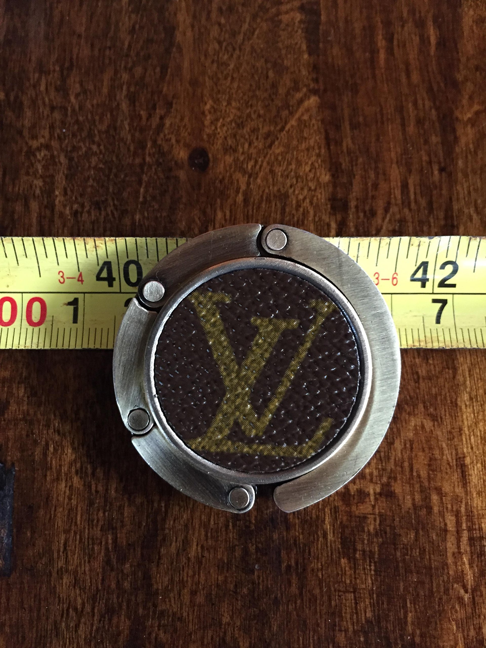 Handcrafted foldable purse hook fashioned with authentic repurposed Louis Vuitton monogram