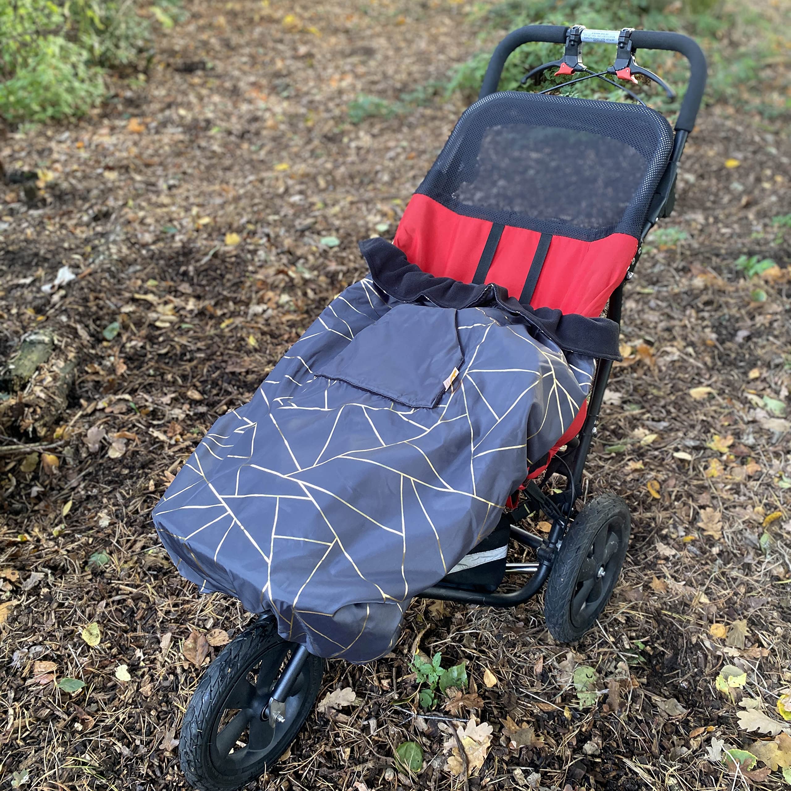 Bundlebean Children’s Wheelchair Cosy – Fleece‑Backed Waterproof Nylon, Front Hand-Warming Pouch, Adjustable Straps – Universal Fit for Wheelchair and Special Needs Buggy - Child Size (Gold Geometric)