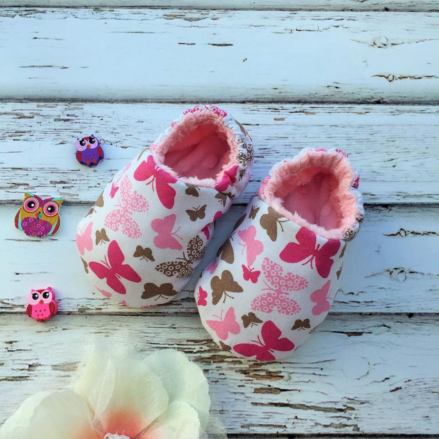 pink baby slippers