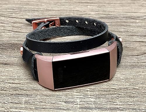 rose gold fitbit with black band