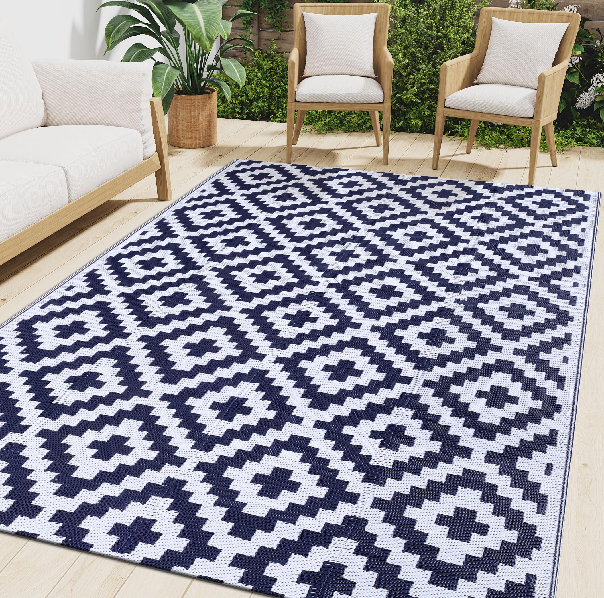Photo 1 of Smiry Waterproof Outdoor Rug 6x9 ft, Reversible Plastic Straw Patio Camping Rugs, Outdoor Indoor RV Mat Carpet for Patio, Outside Entry, Backyard, Deck, Bench, Picnic, Camper, White & Navy