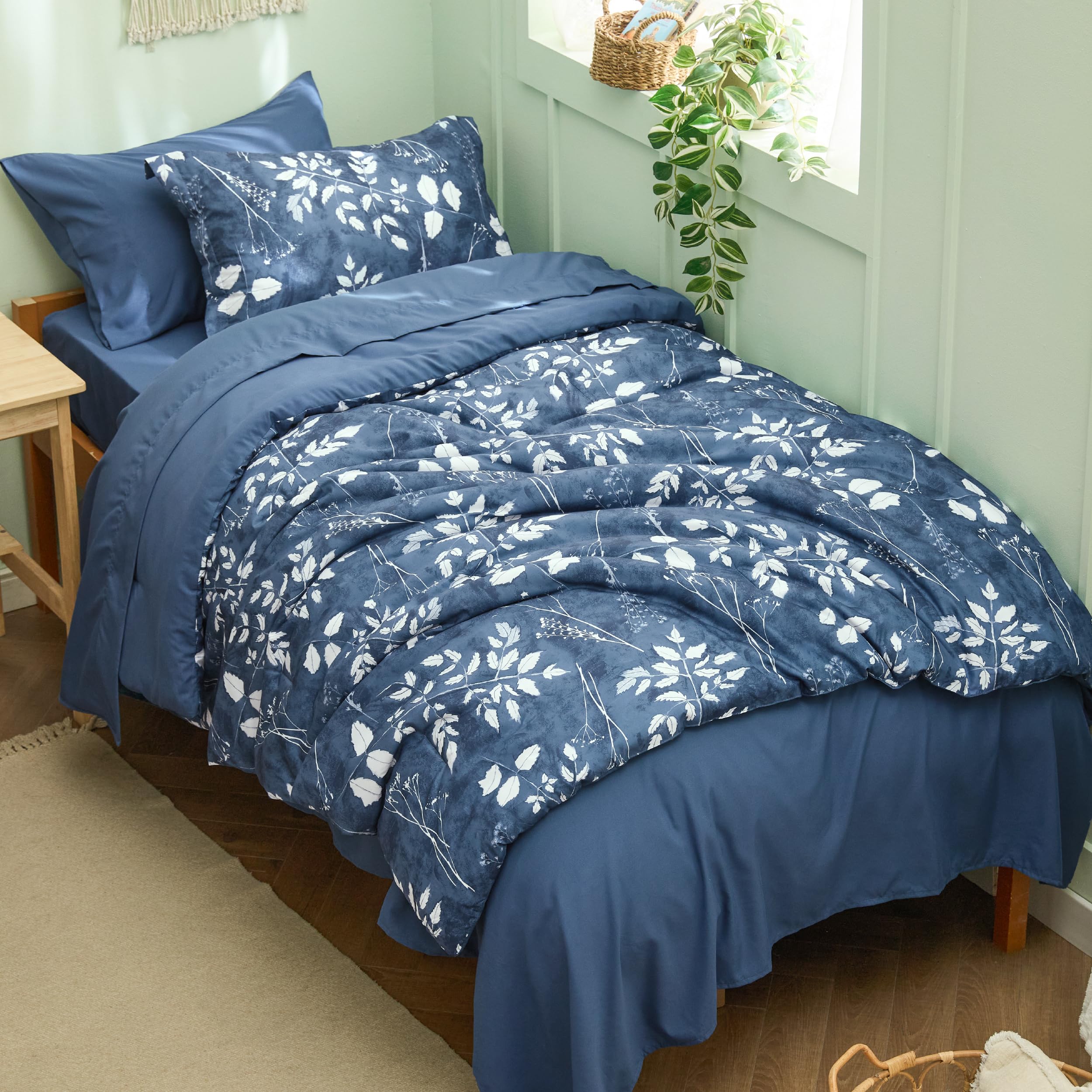 Photo 1 of Bedsure Navy Twin XL Comforter Set - 5 Pieces Floral Bedding Sets Twin XL Bed in a Bag with Reversible Botanical Flowers Comforter, Sheets, Pillowcase & Sham