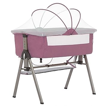 pink bedside bassinet