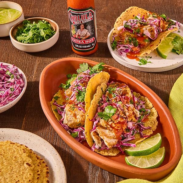 CHOLULA HOT SAUCE, EXTRA HOT, PRODUCT OF MEXICO, BLEND OF ARBOL & PIQUIN PEPPERS FOR BRINGING EXTRA HOT HEAT TO TACOS, EGGS, PIZZA AND MORE, 5 FL OZ