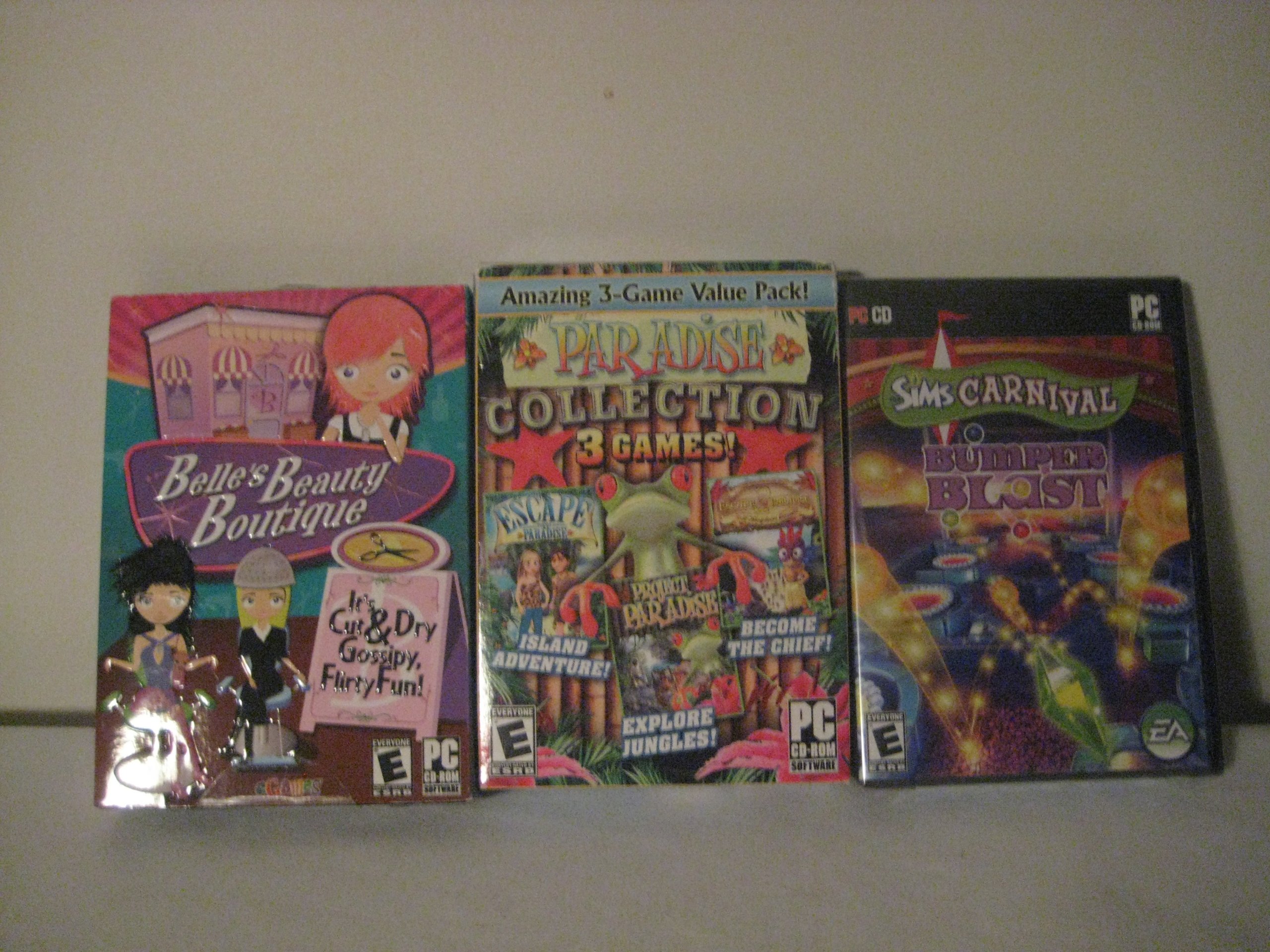An assortment of computer games includes: Qty 1, Belle's Beauty Boutique, (3pack)