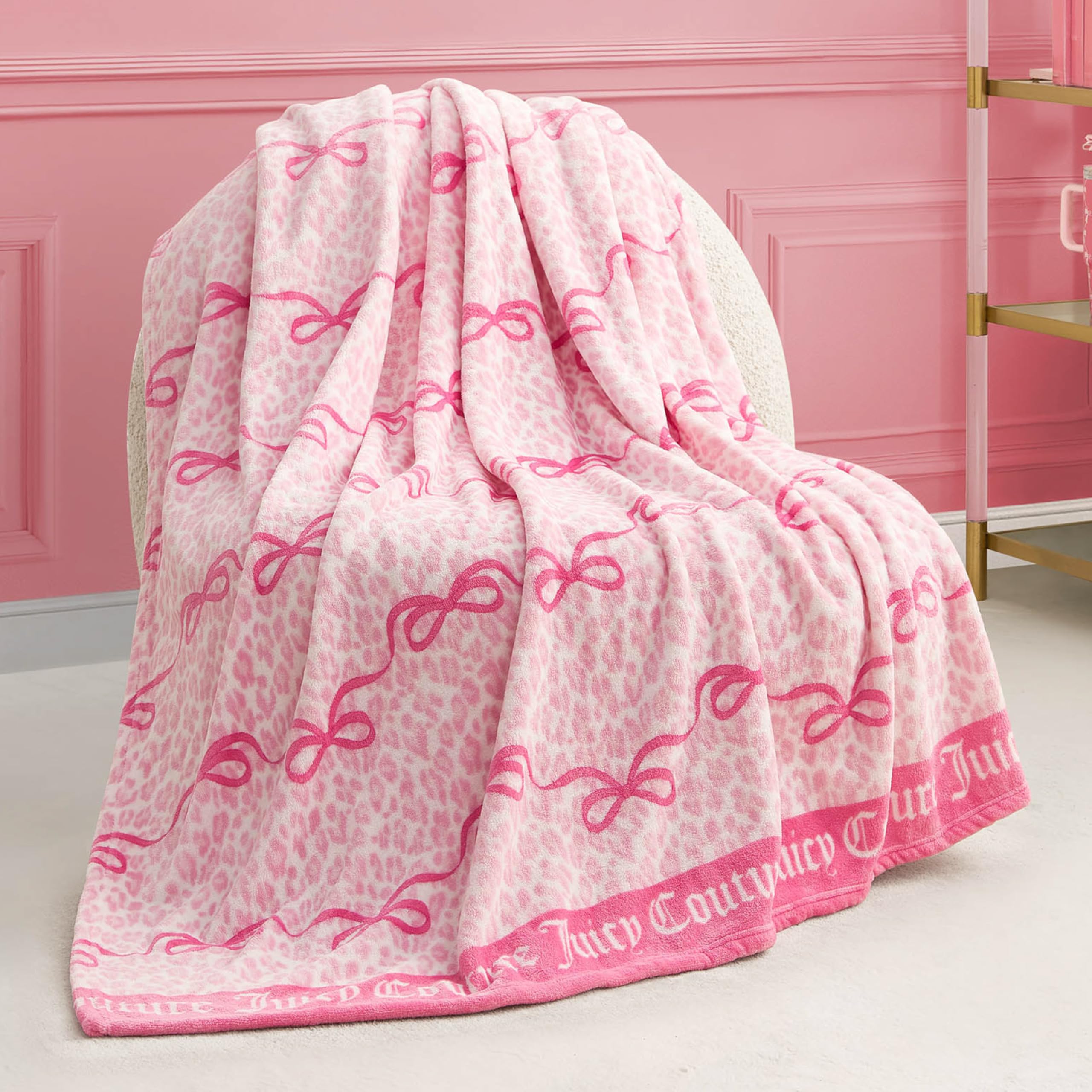Juicy Couture Iconic Leopard Bows 50" x 70" Plush Throw Blanket, Pink - Decorative Blankets for Sofas, Throws for Chairs, and Beds Image
