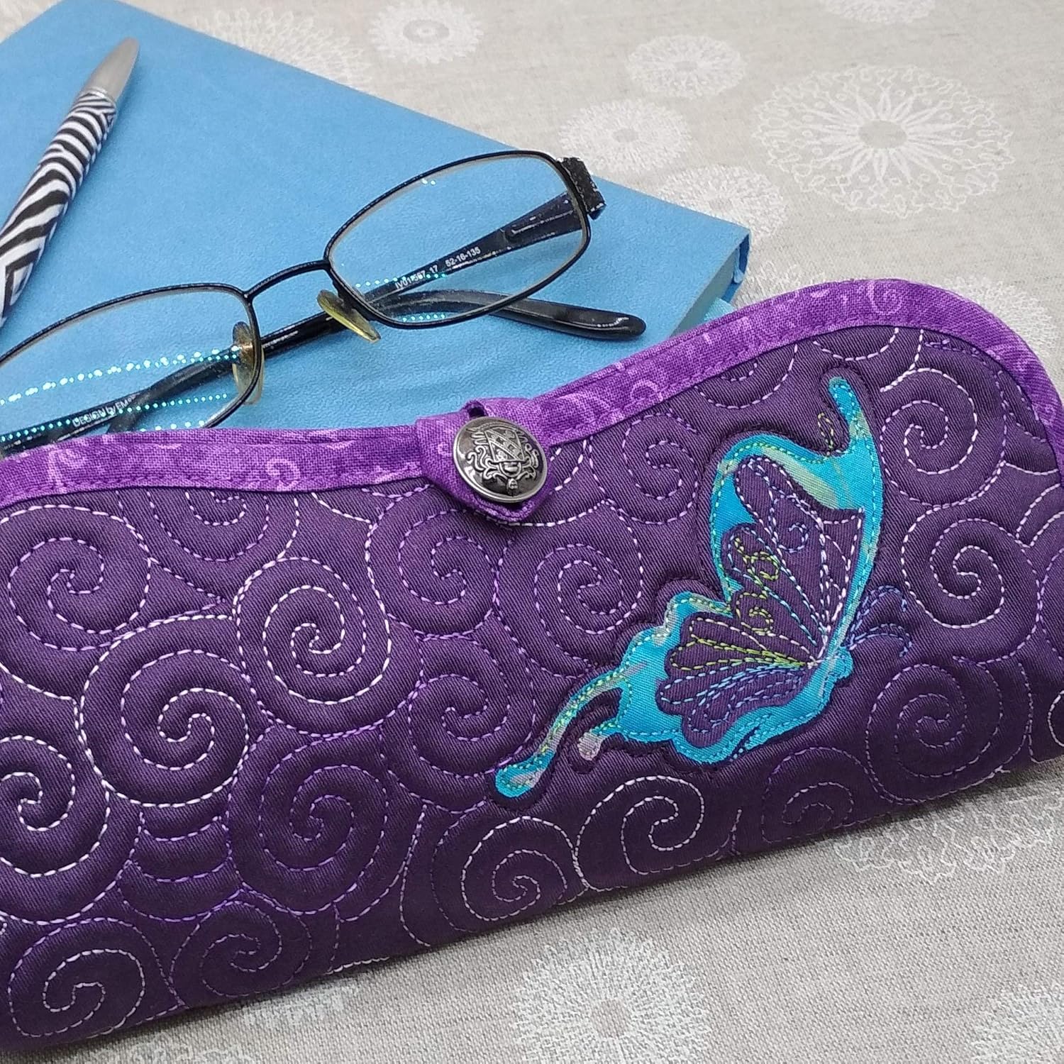 sunglasses with butterfly on them