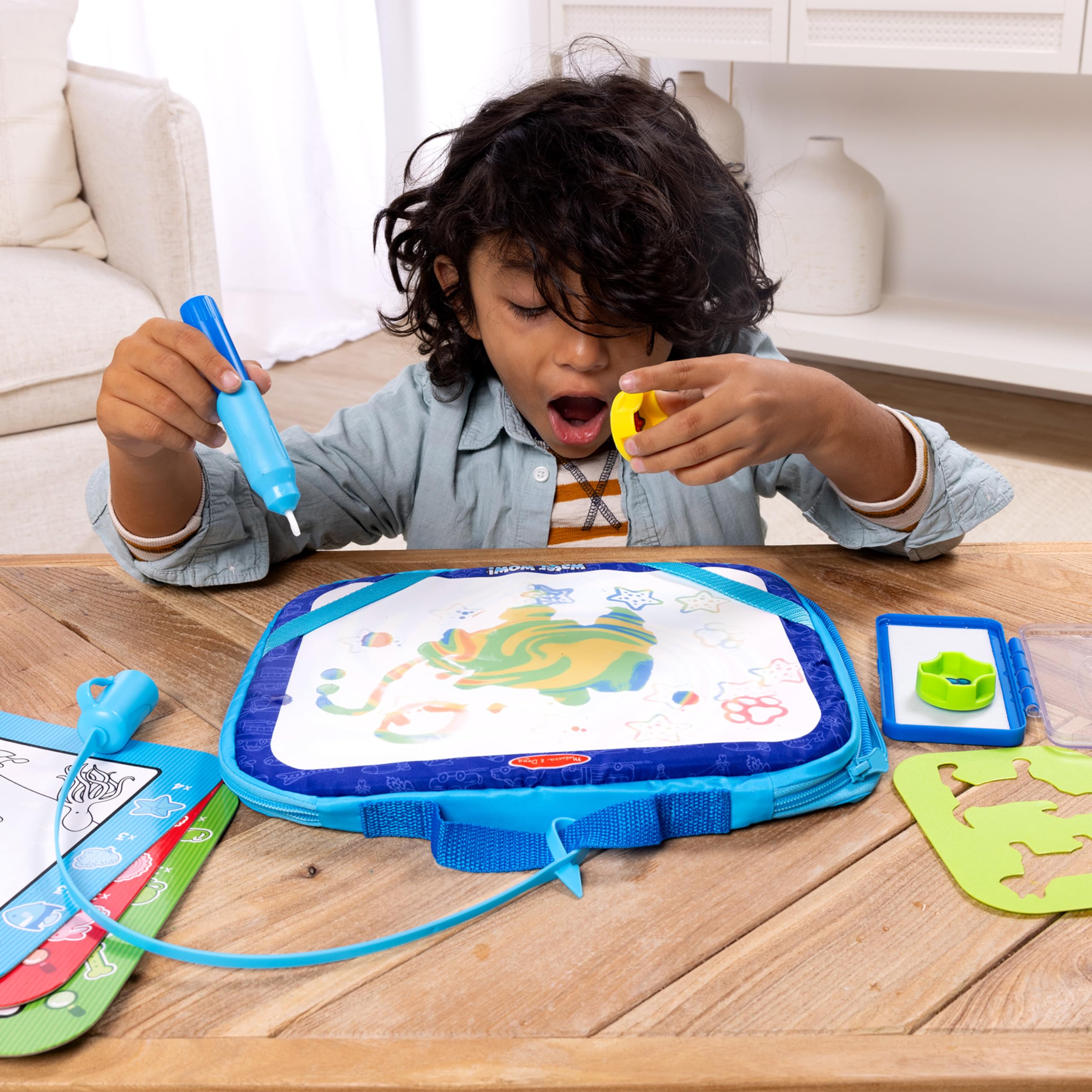 Melissa & Doug Water Wow! Take-Along Reusable Color-Reveal Drawing Set Mess-Free Multi-Activity Pad with Water PenTravel Toy for Toddlers & Kids Ages 3+