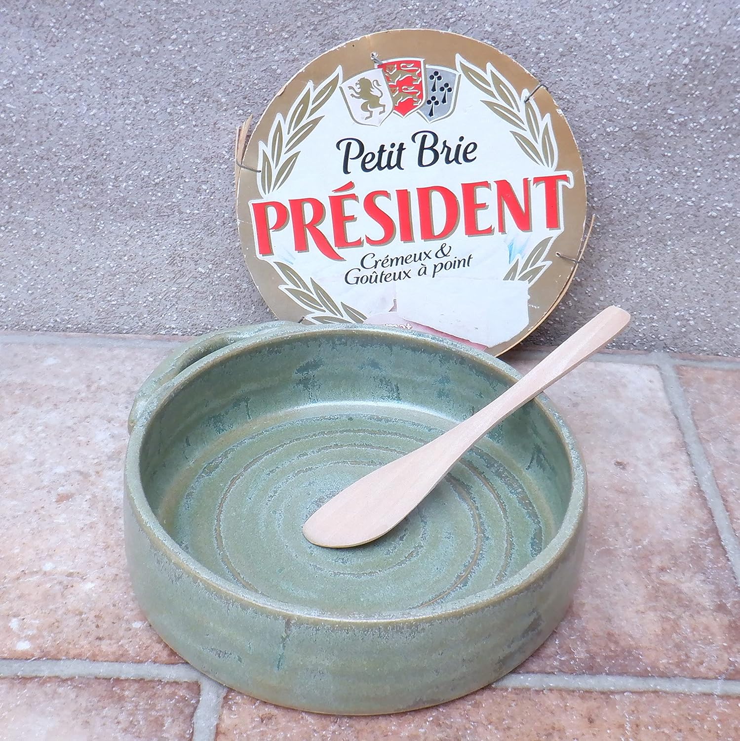 Camembert or brie baking oven serving dish with a bamboo