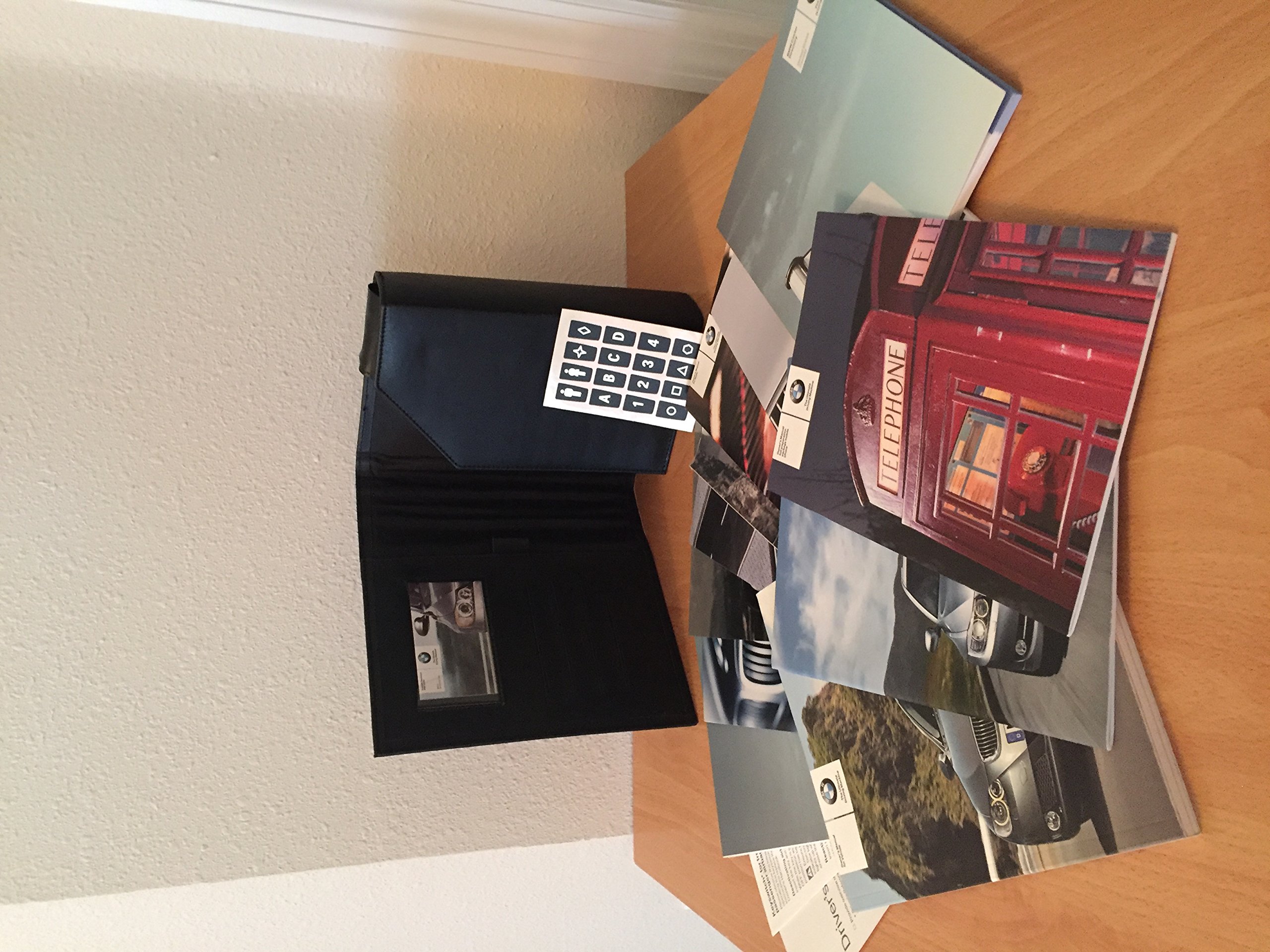 2009 BMW 323i 328i 335i xDrive 335d Sedan / Sports Wagon Owners Manual  Paperback – 2009