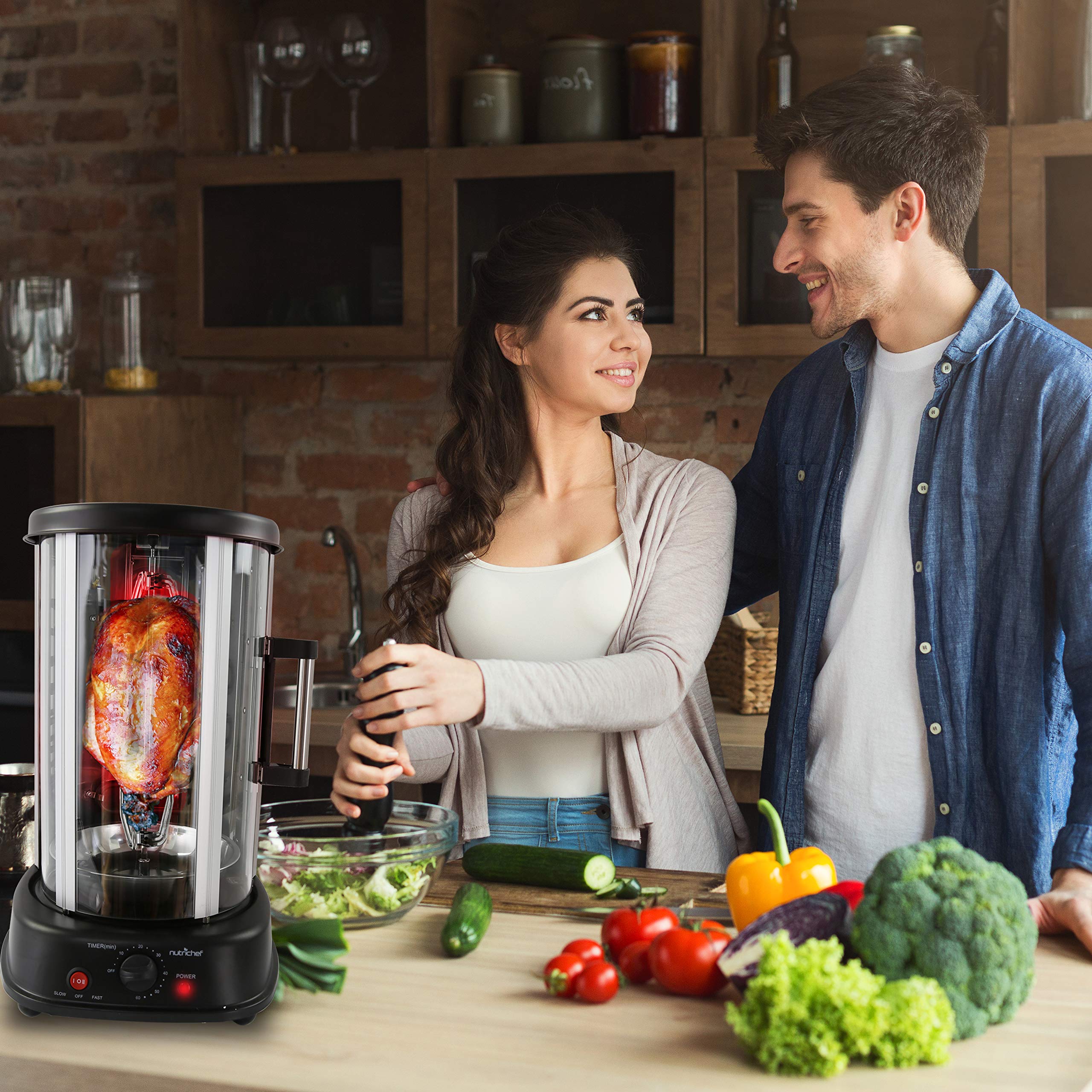 NutriChef Countertop Vertical Rotating Oven - Rotisserie Shawarma Machine, Kebob Machine, Stain Resistant & Energy Efficient W/ Heat Resistant Door, Includes Kebob Rack with 7 Skewers (PKRTVG34)