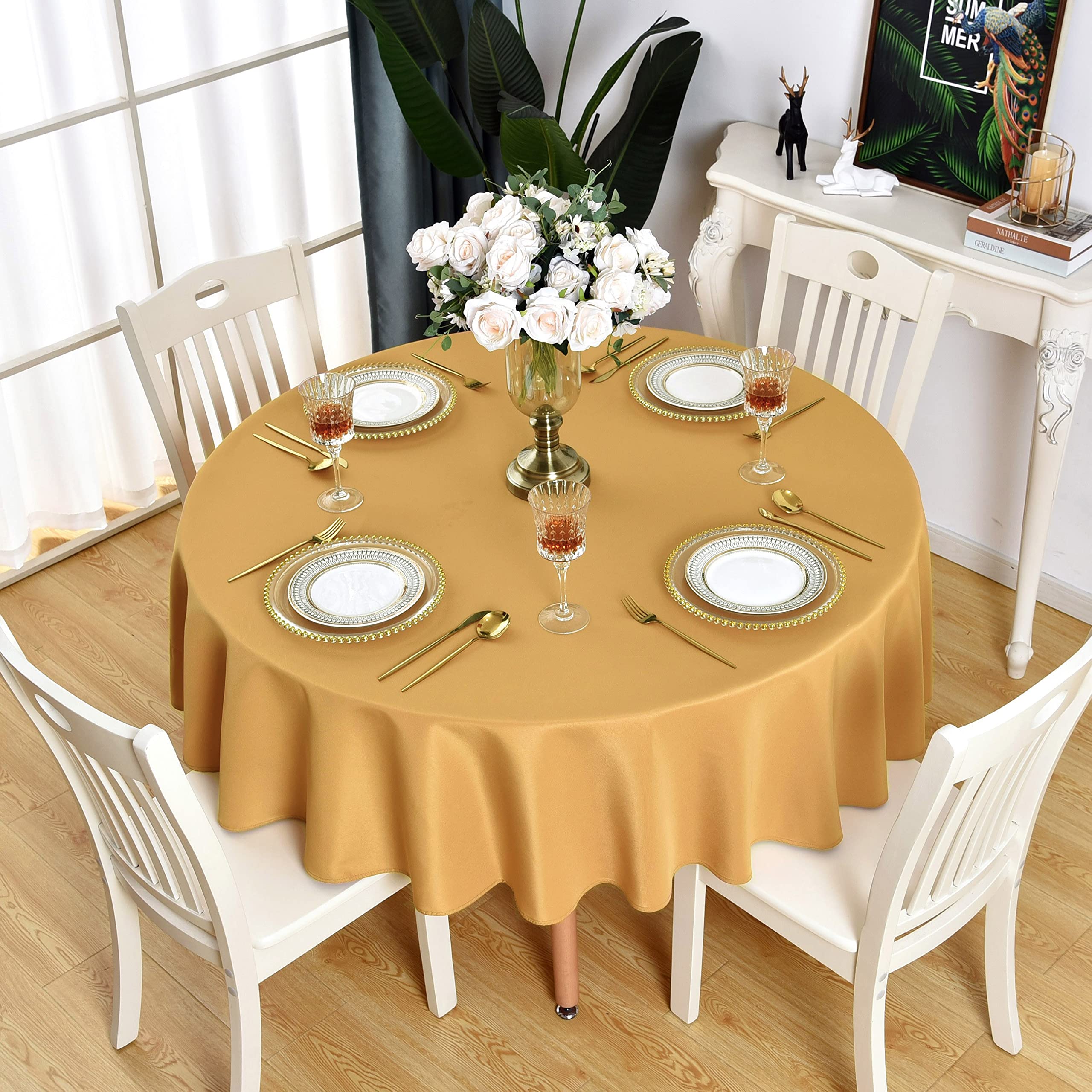 Photo 1 of KAIPHO Gold Round Tablecloth Waterproof Stain Resistant Wrinkle Free Table Cloth 210GSM Polyester Washable Wipeable Table Cover for Party, Banquet, Wedding, Indoor and Outdoor use (48 inch, Circle)