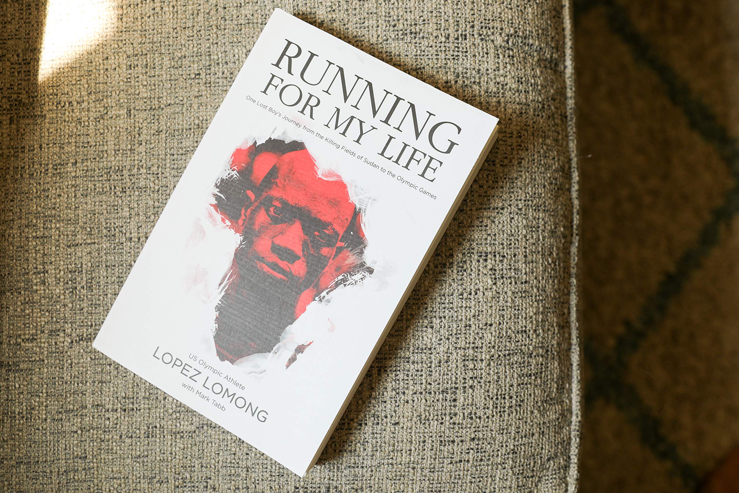 Running for My Life: One Lost Boy's Journey from the Killing Fields of Sudan to the Olympic Games Running for My Life: One Lost Boy's Journey from the Killing Fields of Sudan to the Olympic Games Running for My Life: One Lost Boy's Journey from the Killing Fields of Sudan to the Olympic Games Paperback Audible Audiobook Kindle Hardcover Audio CD