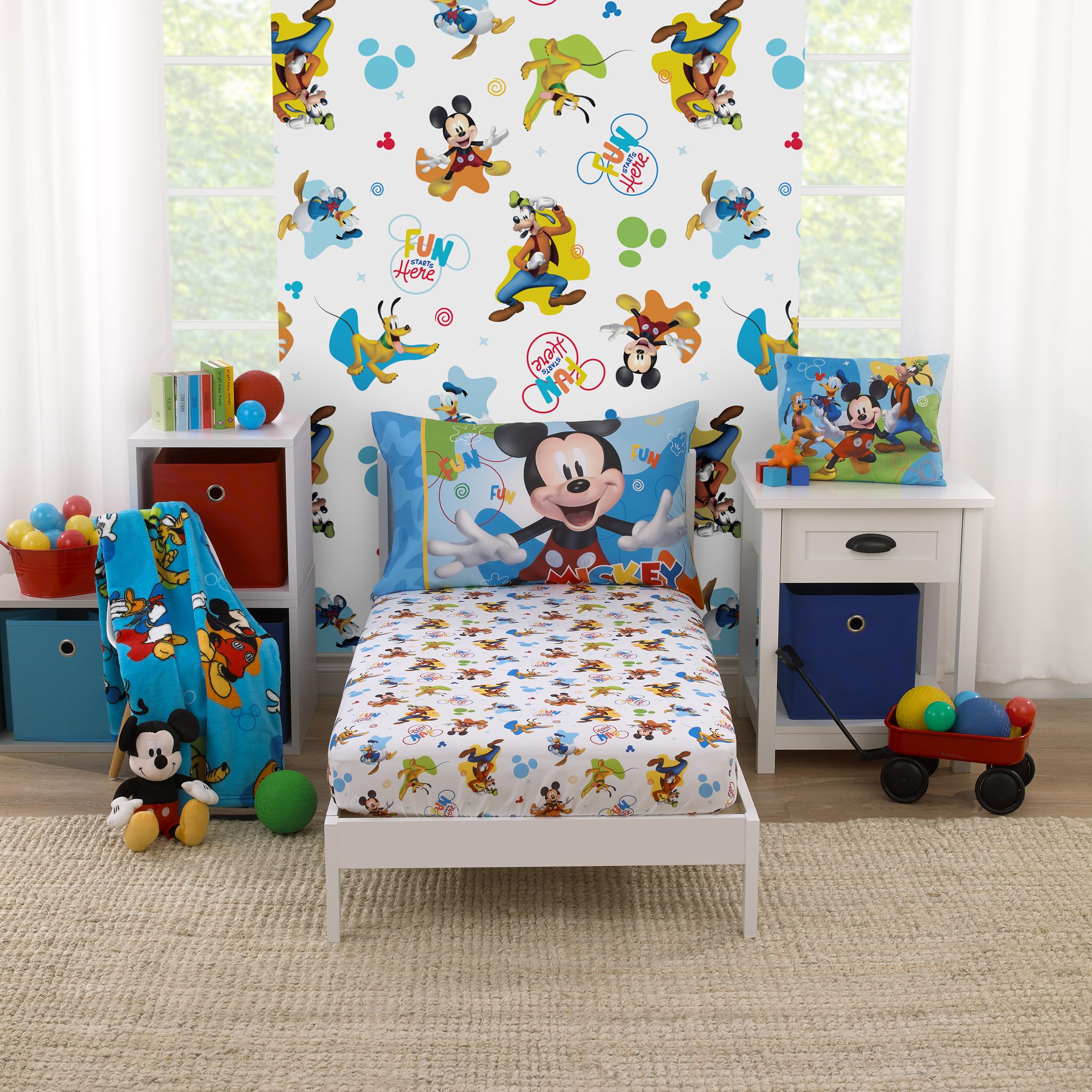 Photo 1 of Disney Mickey Mouse Blue, Red, Green, and White, Donald Duck, Pluto, and Goofy, Fun Starts Here 2 Piece Toddler Sheet Set - Fitted Bottom Sheet, and Reversible Pillowcase