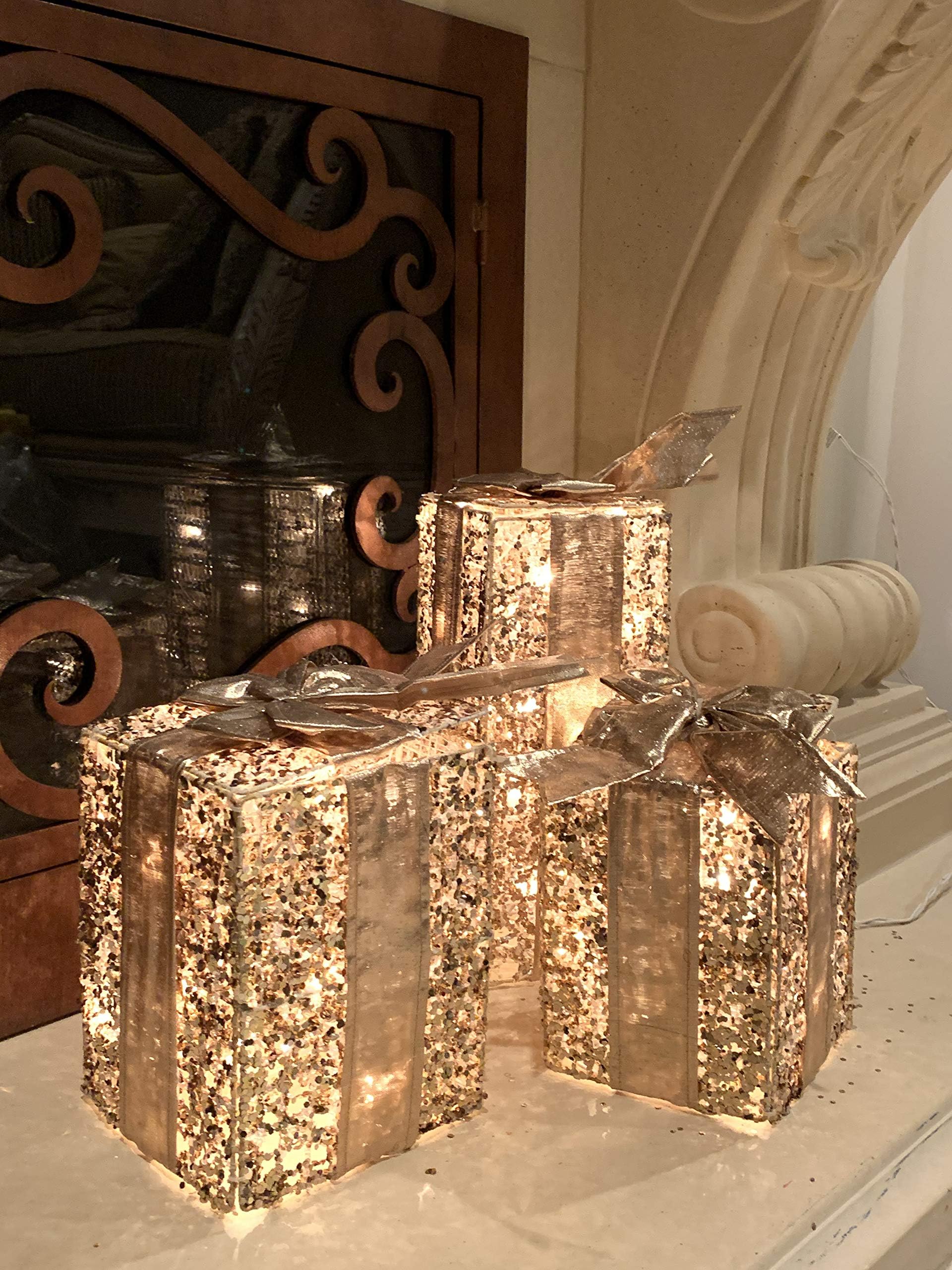 Oxford Port Pre-lit Set of 3 Assorted Gold Gift Boxes with UL Listed Clear Lights 7", 8" and 12" High x 5" x 5" Squares