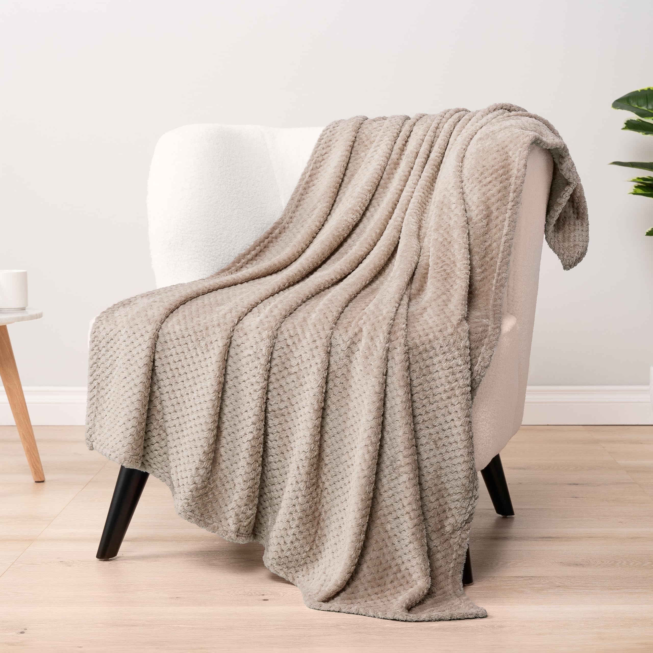 Photo 1 of (USED/FAIR) PAVILIA Tan Taupe Throw Blanket for Couch Bed, Soft Fleece Throws for Sofa Chair, Fuzzy Waffle Textured Blanket, Cozy Warm Lightweight All Season Blanket Throw, 50x60