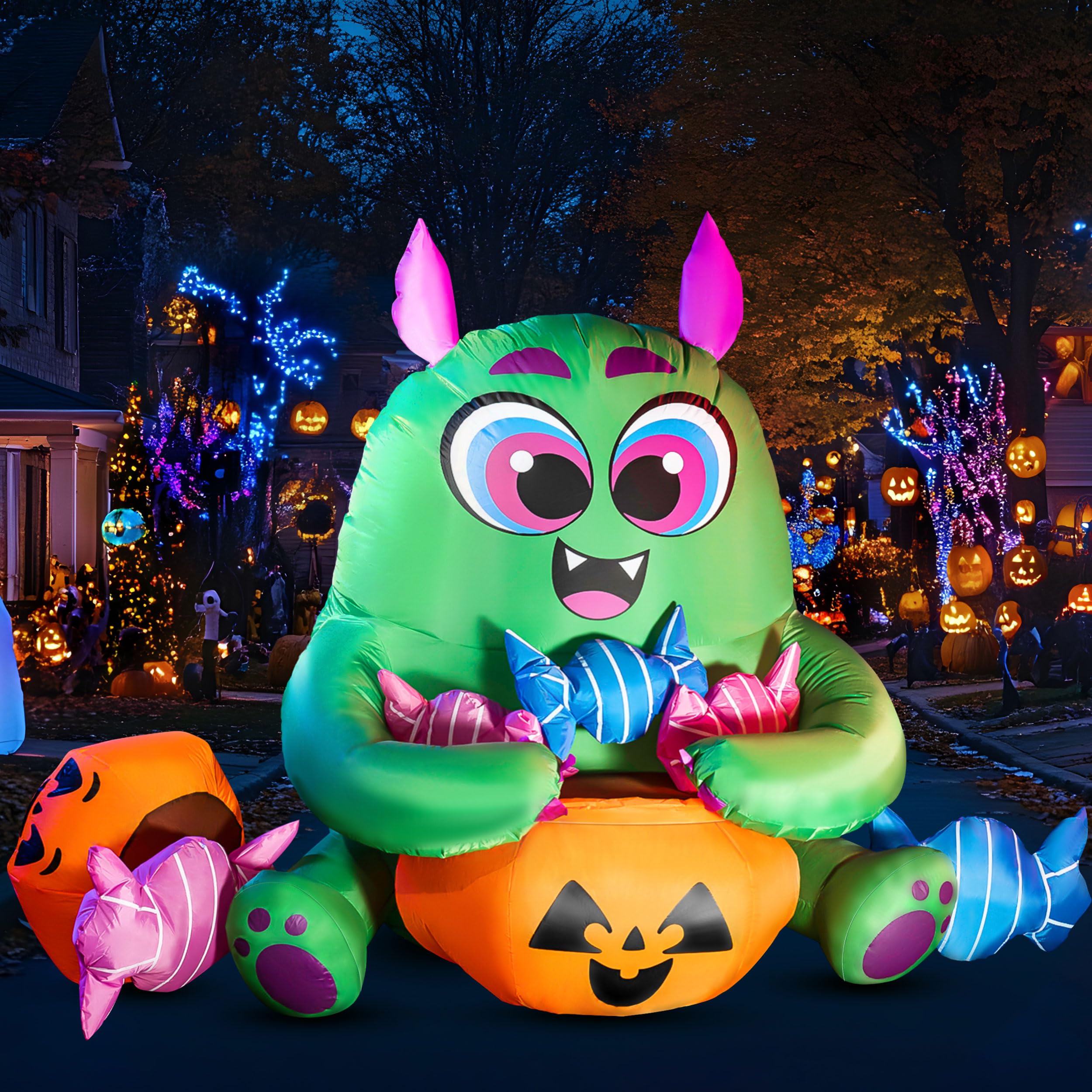 Photo 1 of Joiedomi 5 Ft Long Cute Halloween Inflatables Monster with Candies Outdoor Decorations, Blow Up Monster with Build-in LEDs Halloween Inflatables for Indoor, Outdoor, Yard, Garden, Lawn Decorations