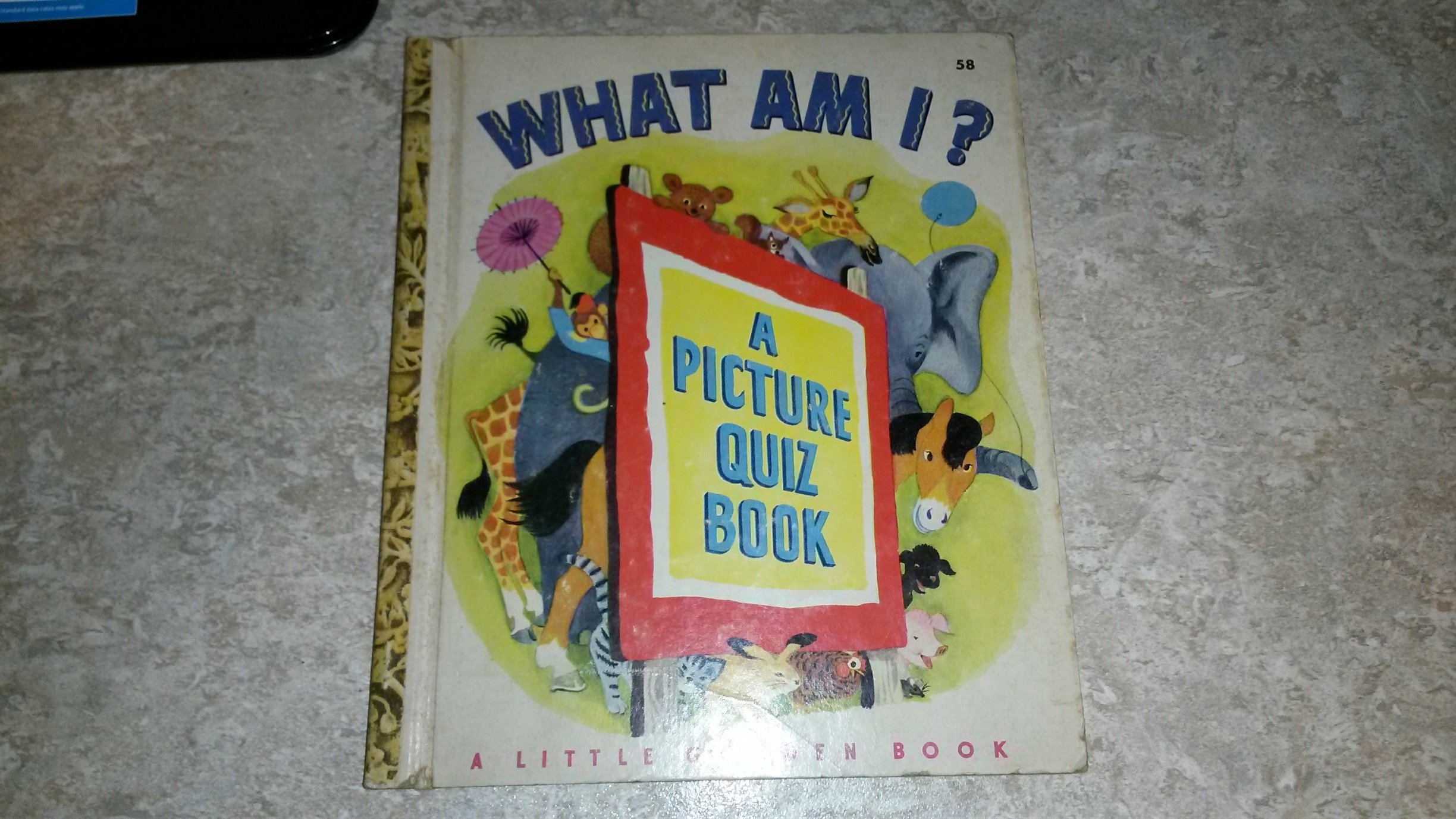 What Am I A Picture Quiz Book Little Golden Book 58 Leon Ruth Amazon Com Books