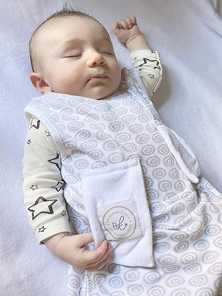 baby unzipping sleeping bag