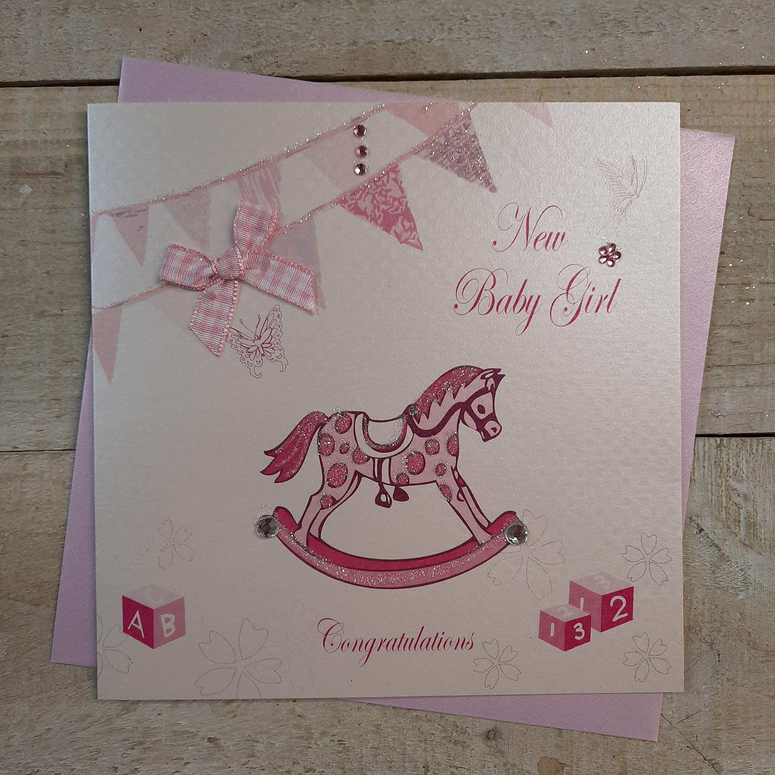 white cotton cards "New Baby Girl Congratulations Handmade Card, White