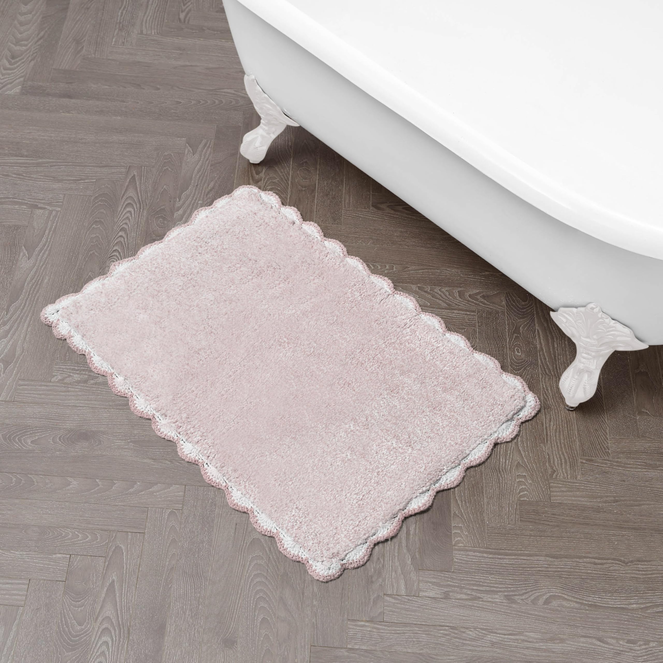 Photo 1 of ***BLUSH/WHITE COLOR MIX*** Laura Ashley Heathered Crochet Border 100% Cotton 20" x 32" Skid-Resistant Bath Rug, Blush Pink