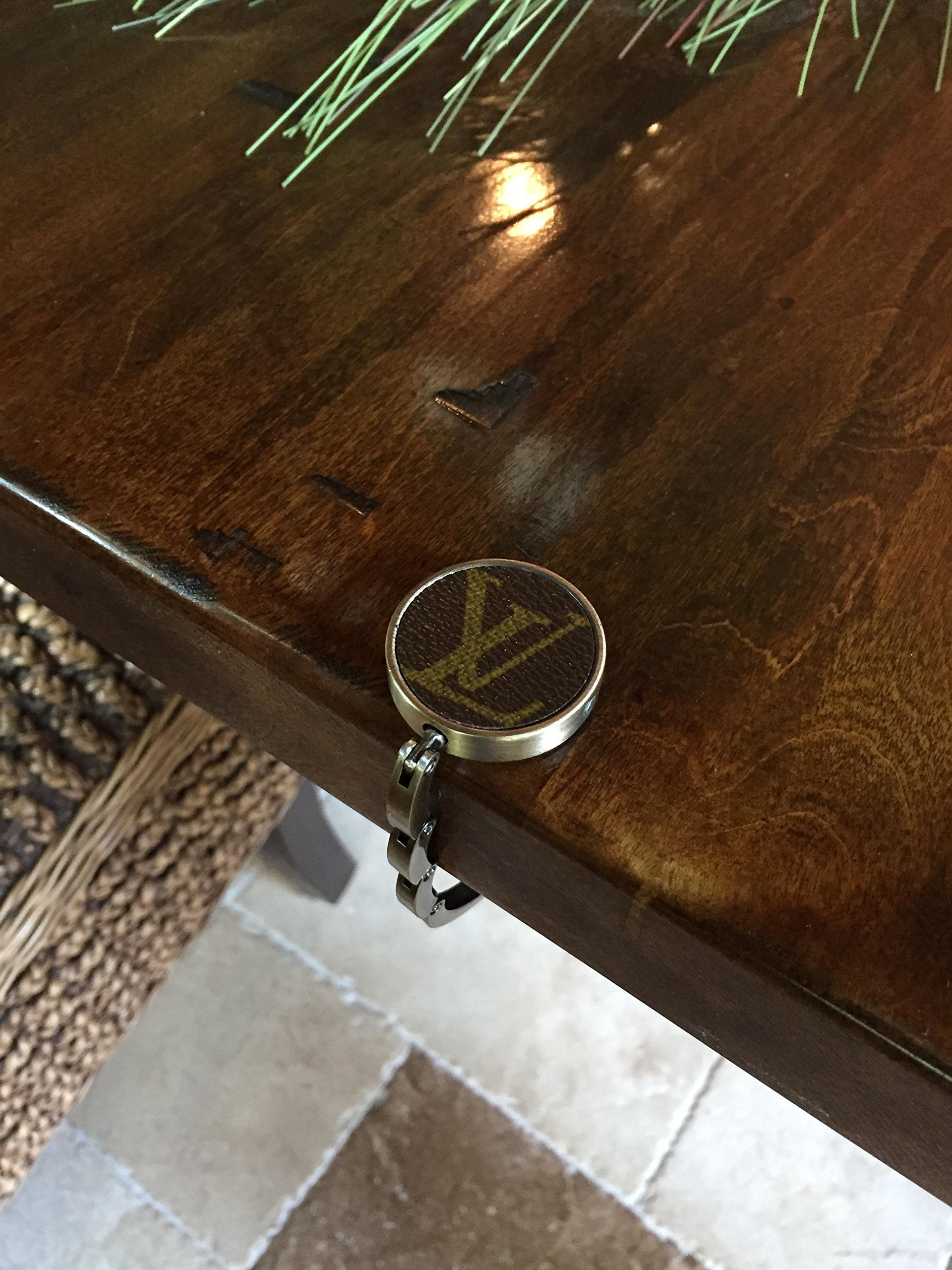 Handcrafted foldable purse hook fashioned with authentic repurposed Louis Vuitton monogram