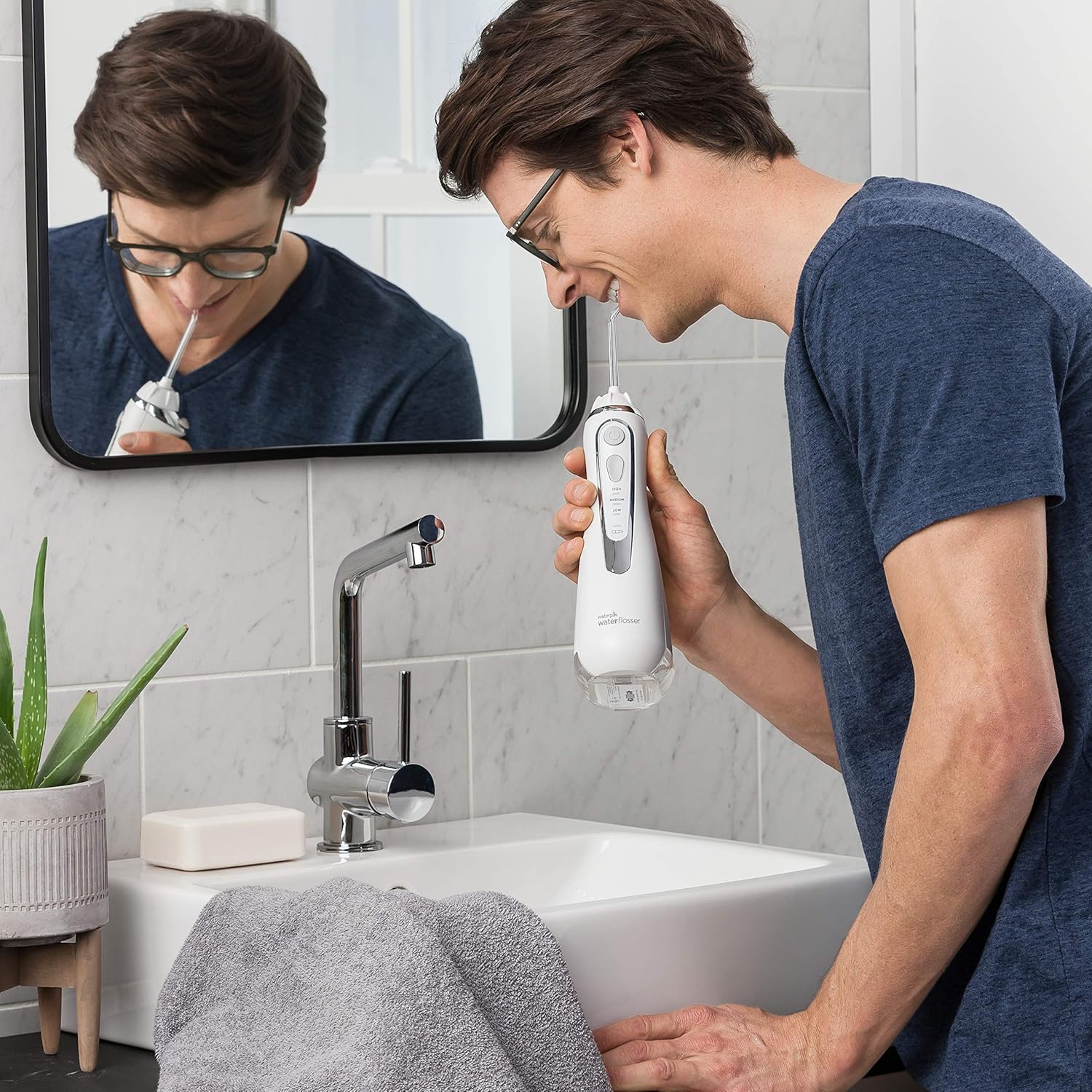 Waterpik Cordless Water Flosser Rechargeable Portable Oral irrigator for Travel & Home – Cordless Advanced, Wp-560 White: Beauty
