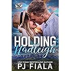 Holding Hadleigh (Lynyrd Station Protectors - Trafficking Book 2)
