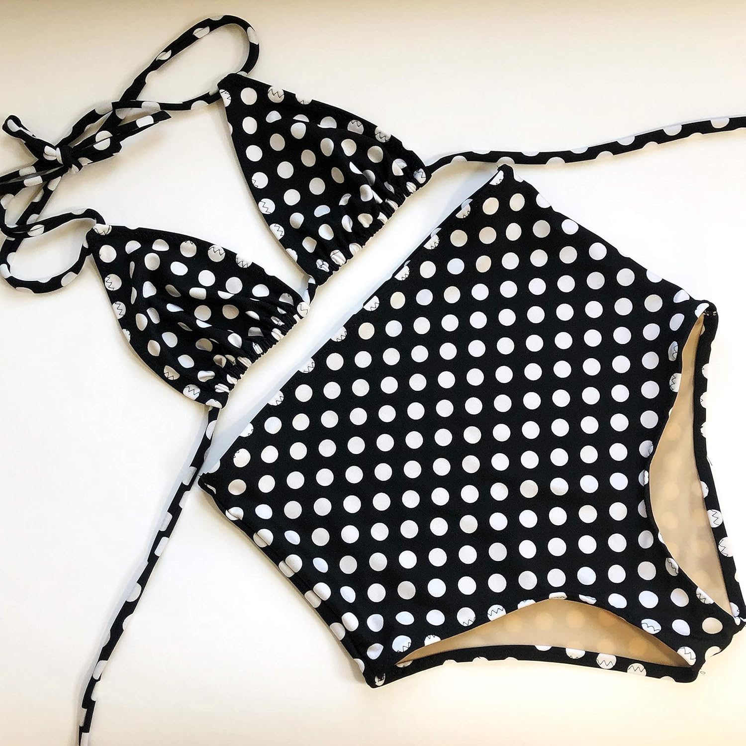 black polka dot swimsuit