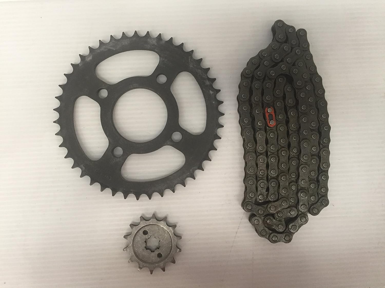 Kit de arrastre, Piñon, Sprocket y Cadena, Aplica para Motocicletas Bajaj Modelos Discover 125