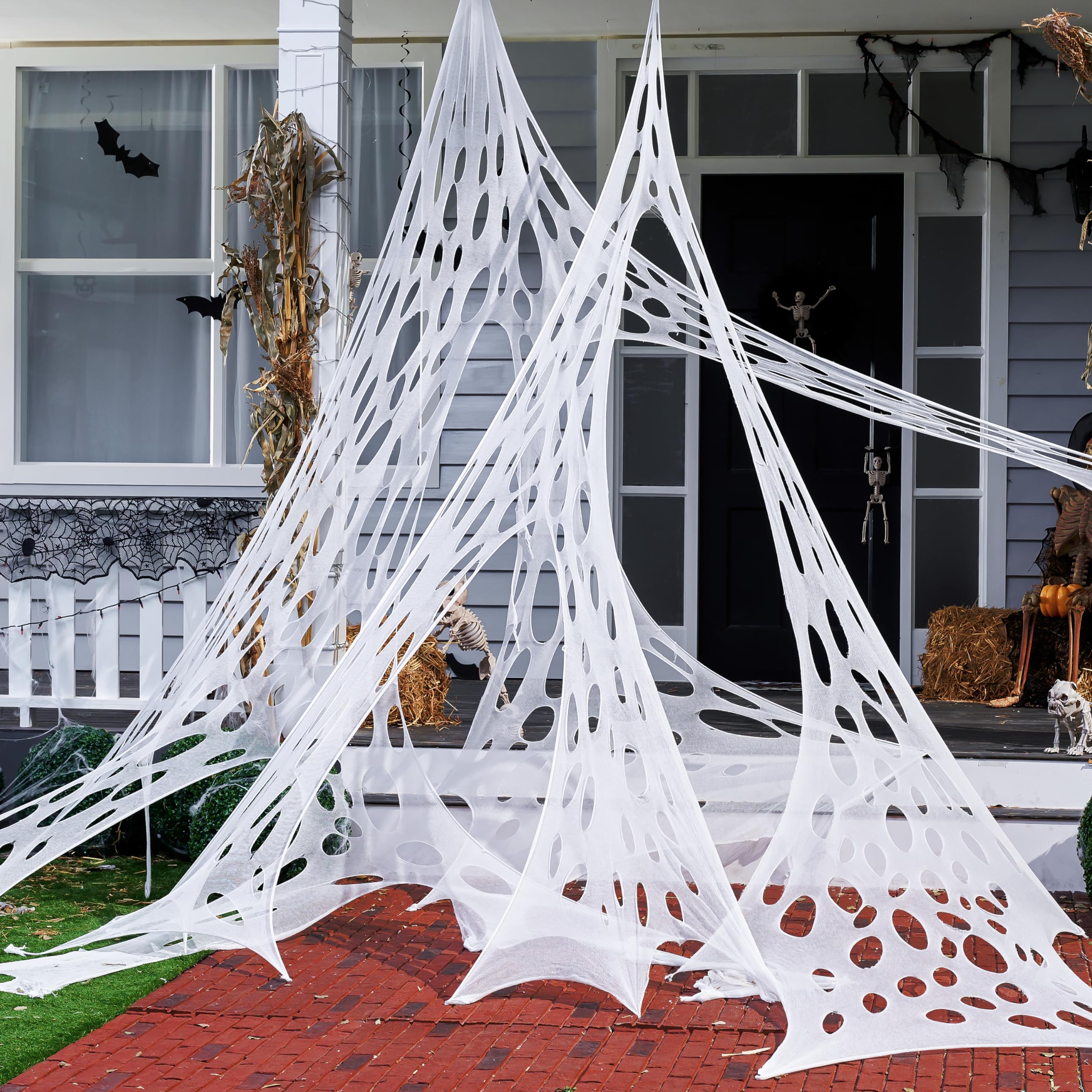 Photo 1 of 1000sqft Halloween Giant Spider Web Decoration,Cut Your Own Stretchy Spider Netting, DIY Spooky Flexible Spider Webs Decor for Halloween Haunted House Outdoor Decorations Holiday Party Supplies