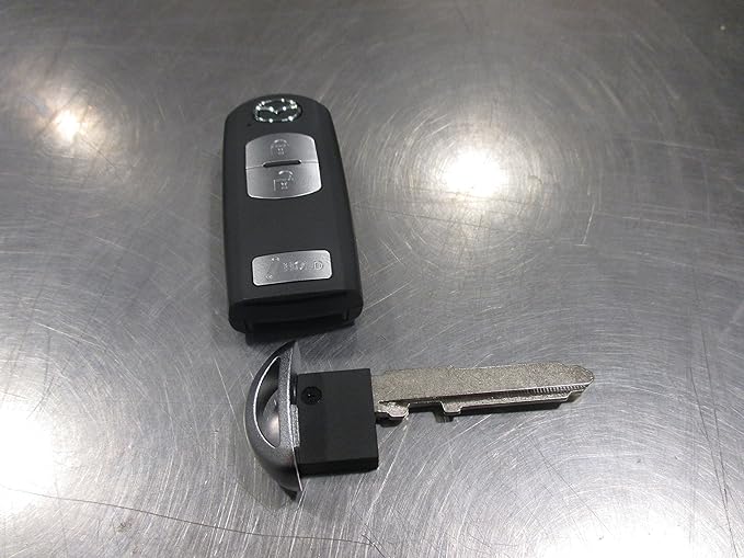 Mazda CX5 20132016 New OEM key less transmitter Amazon.co.uk