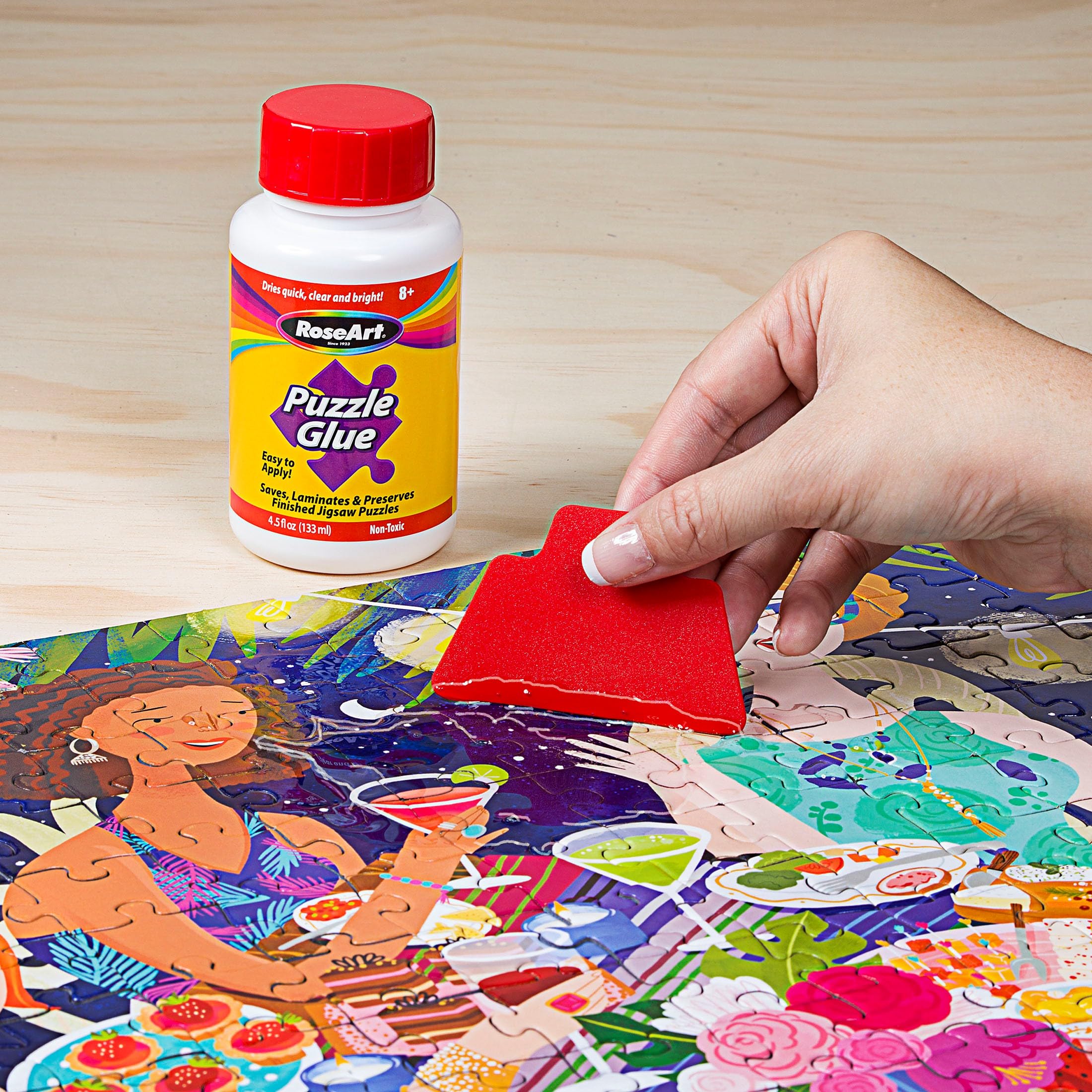 RoseArt Jigsaw Puzzle Glue with Applicator - Saves, Laminates and Preserves Finished Jigsaw Puzzles - Easy to Apply, Dries Quick, Clear & Bright