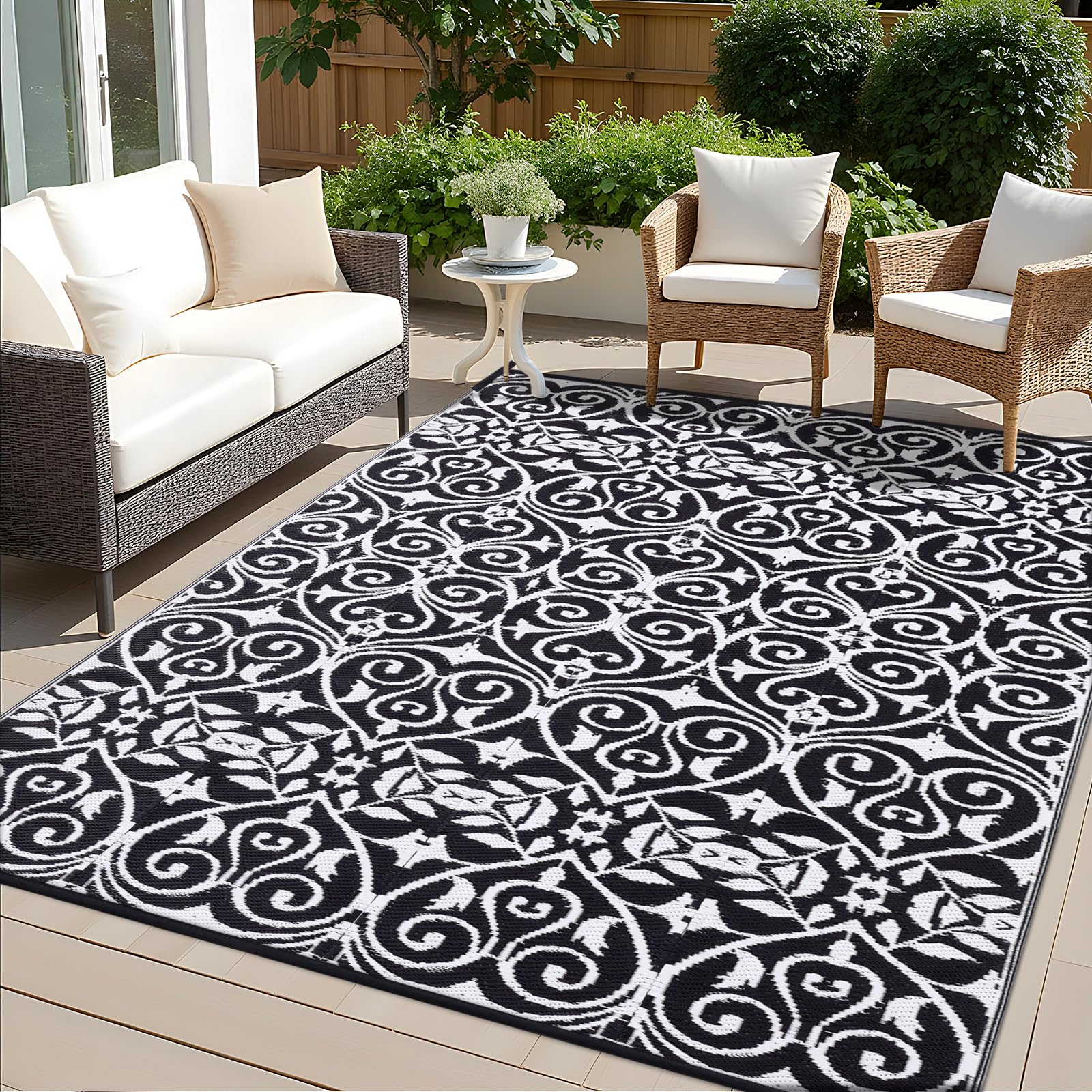 Photo 1 of OLANLY Outdoor Rug Waterproof 6x9 ft Clearance, Reversible Outdoor Plastic Straw Rug with Floral Pattern, RV Mat for Patio, Camping, Balcony, Deck, Backyard, Black & White