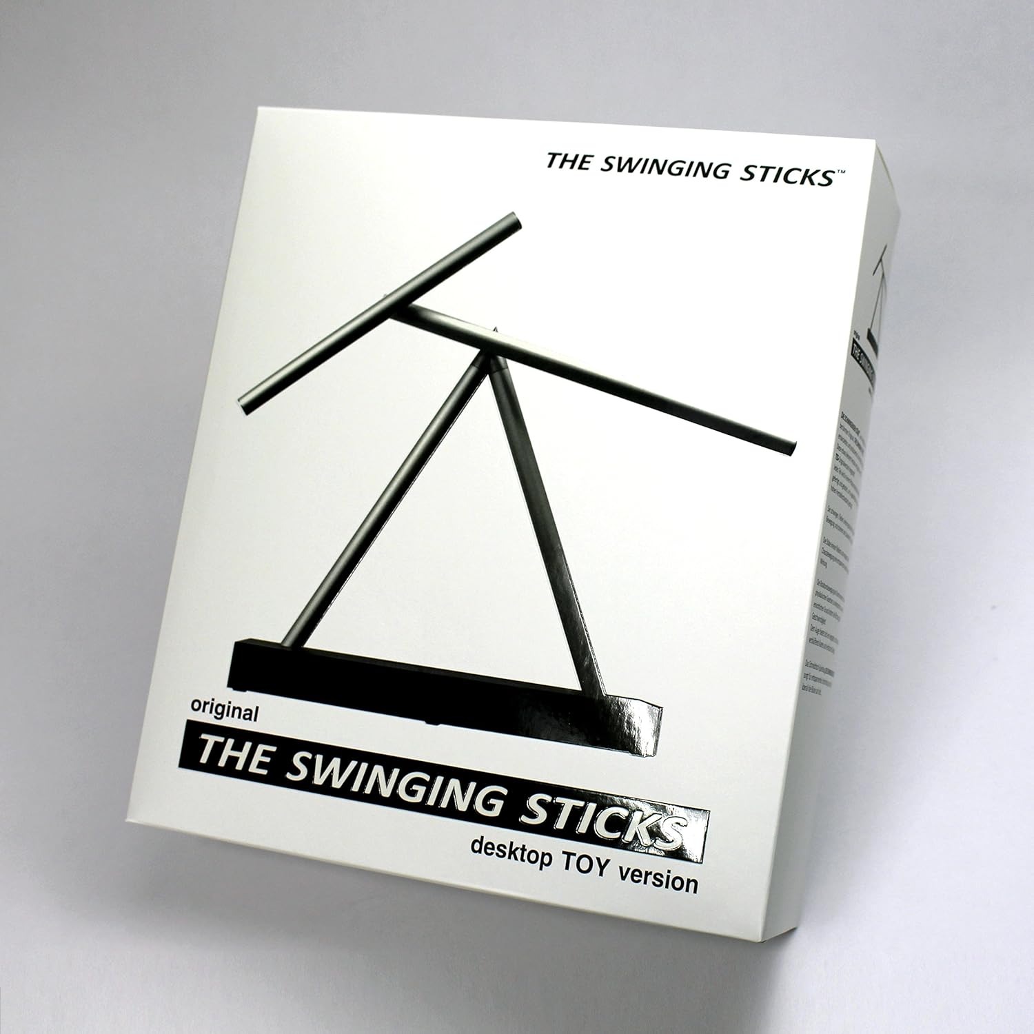 spinning sticks kinetic desk sculpture