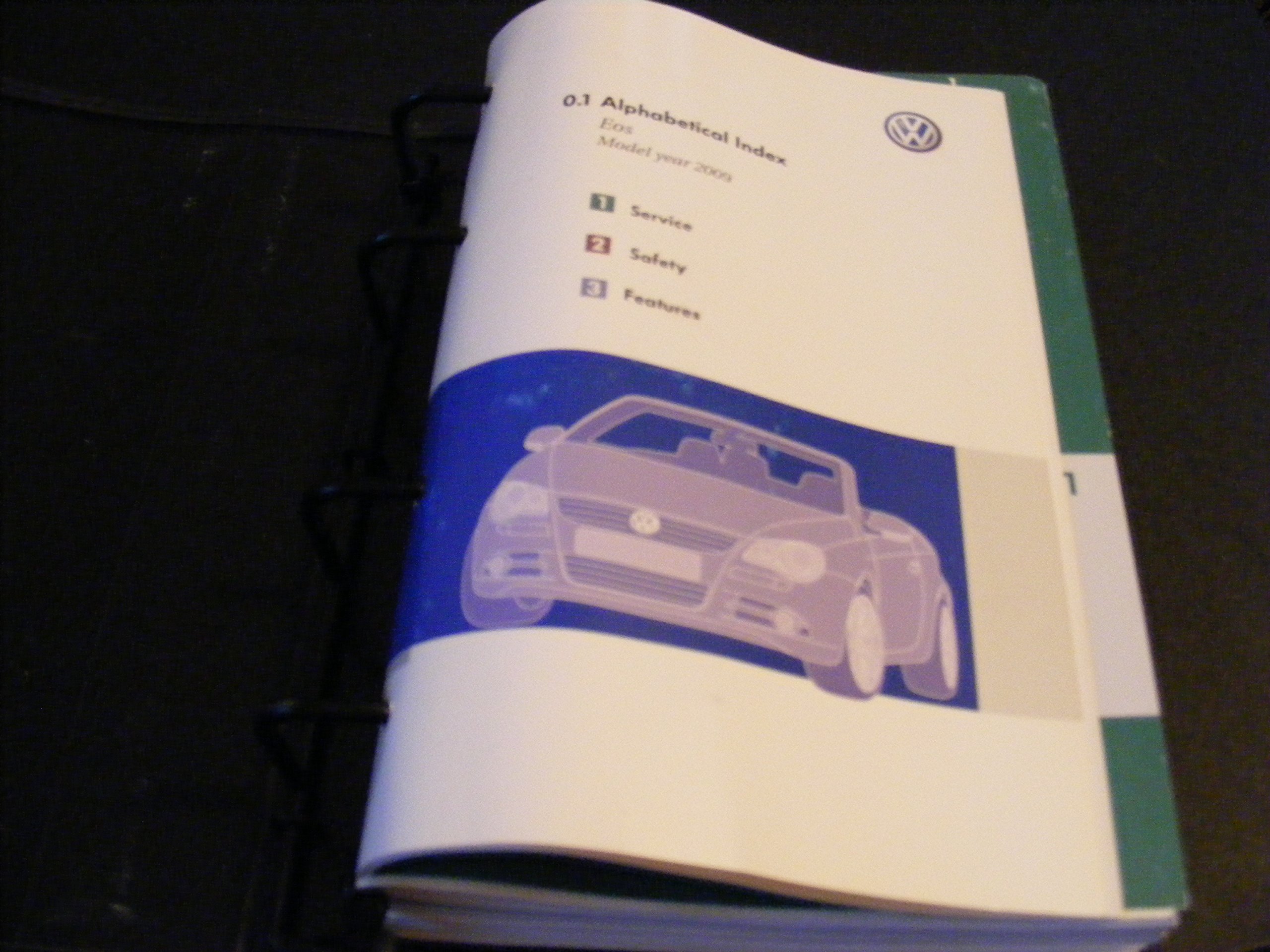 Volkswagen EOS Owners Manual Paperback – 2009