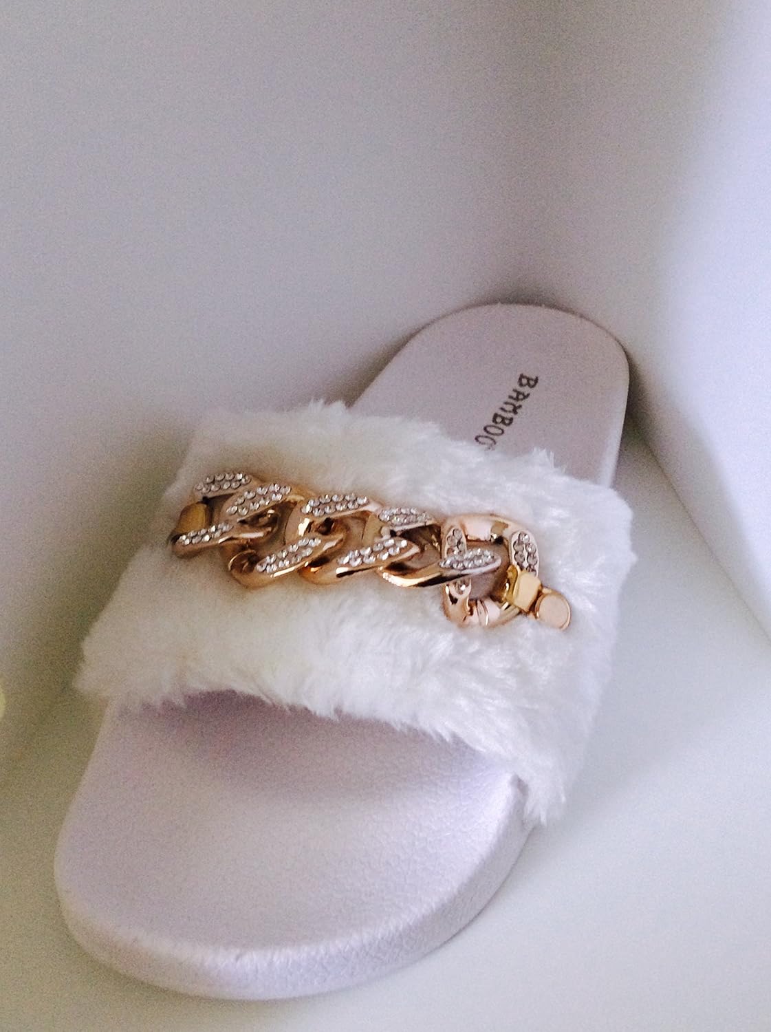 white faux fur slides